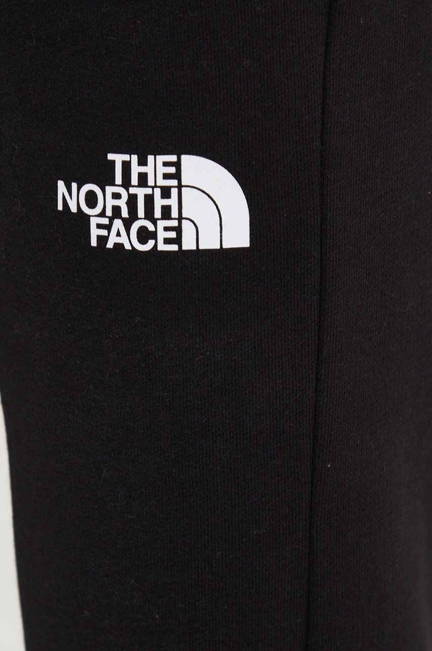 The North Face Bavlněné tepláky černá barva - Pepit.cz