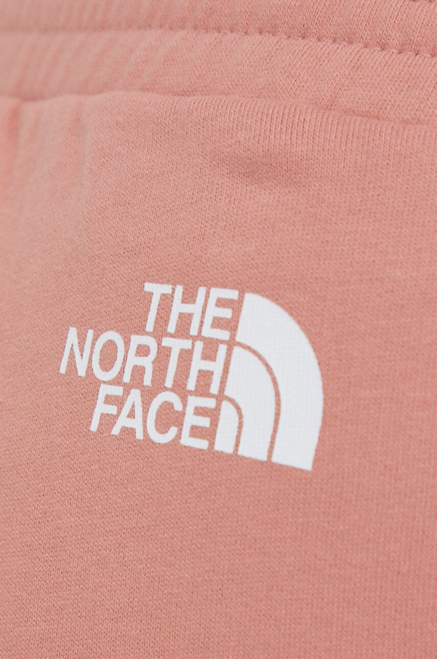 The North Face Bavlněné tepláky dámské růžová barva hladké - Pepit.cz