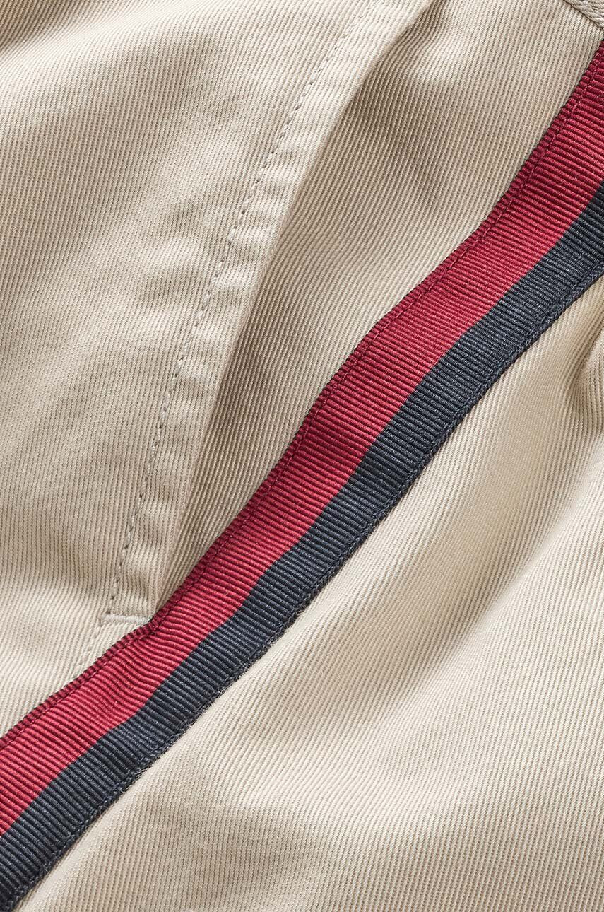 Tommy Hilfiger Dětské kalhoty béžová barva hladké - Pepit.cz