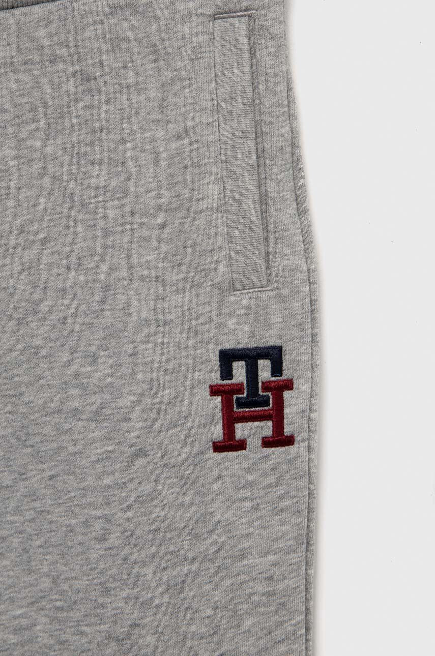 Tommy Hilfiger Dětské tepláky tmavomodrá barva hladké - Pepit.cz