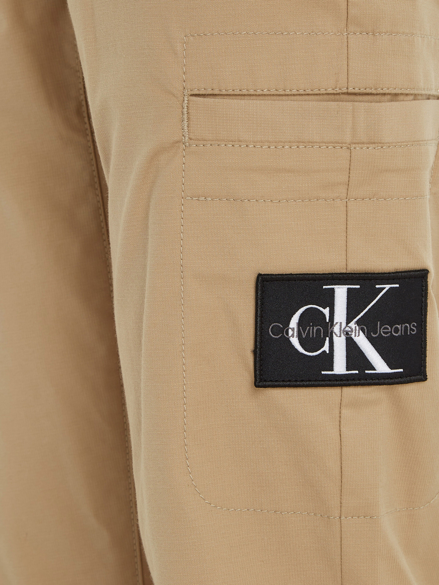 Calvin Klein Jeans Chino Kalhoty Béžová - Pepit.cz