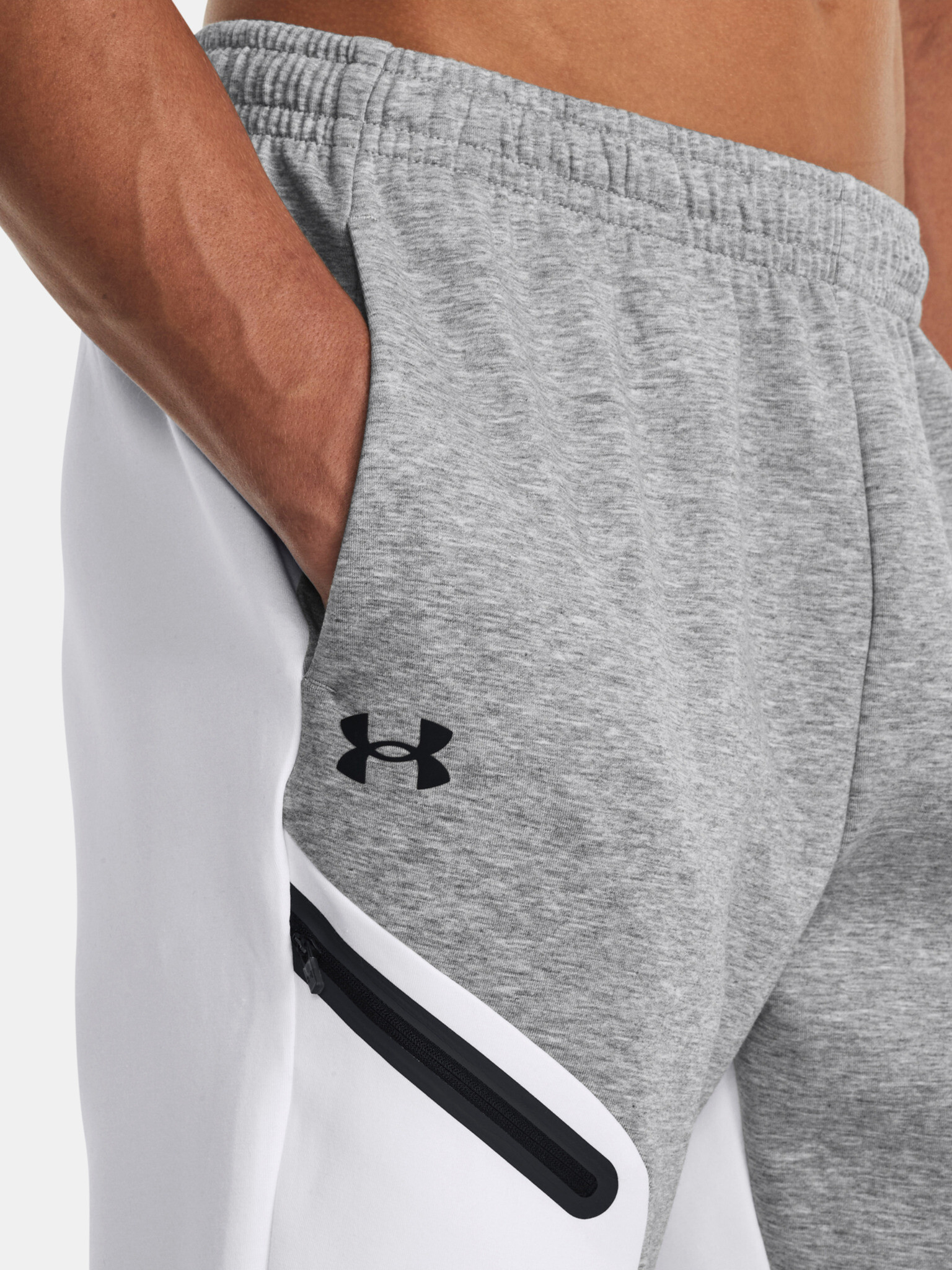 Under Armour UA Unstoppable Flc Tepláky Bílá - Pepit.cz