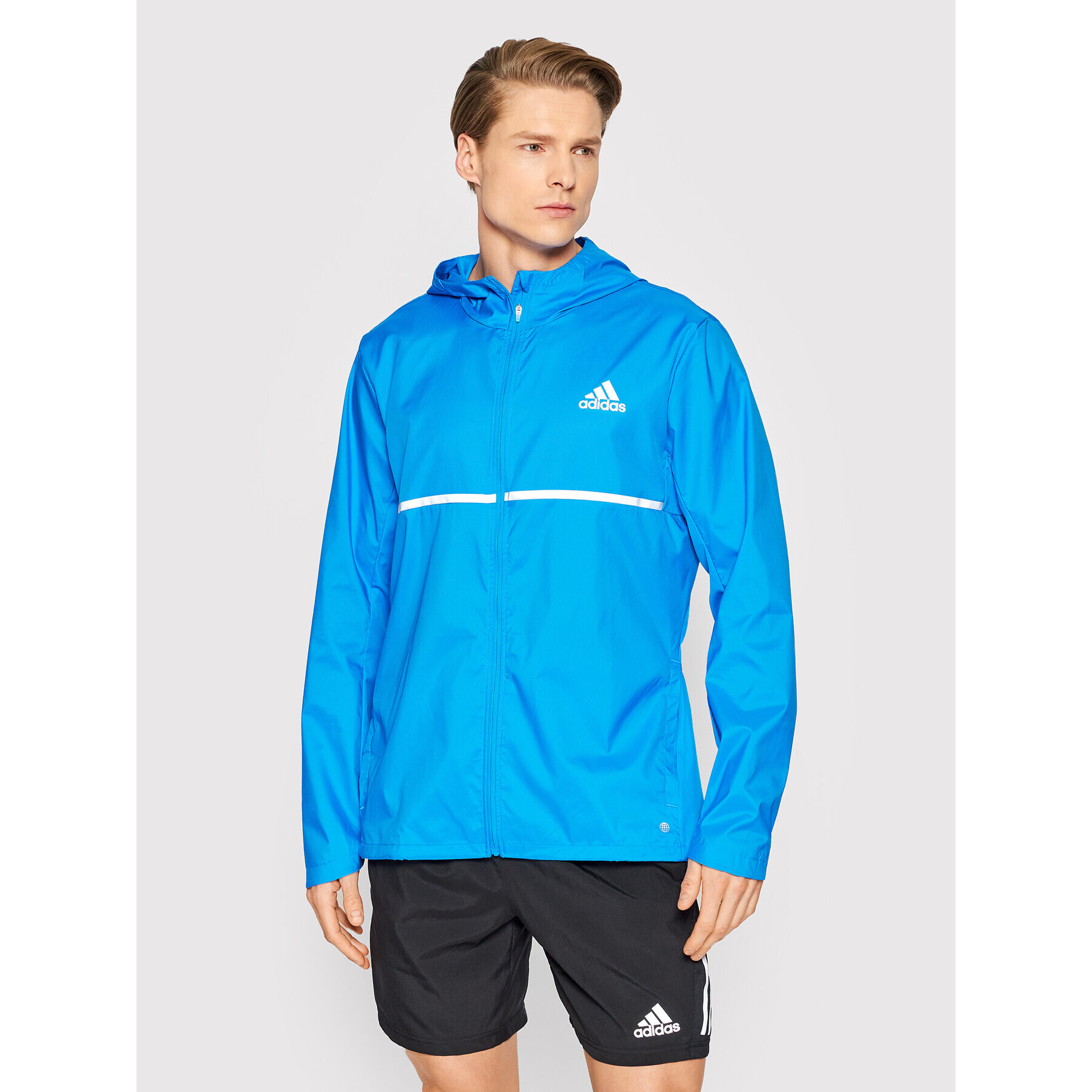 adidas Běžecká bunda Own the Run HB7426 Modrá Regular Fit - Pepit.cz