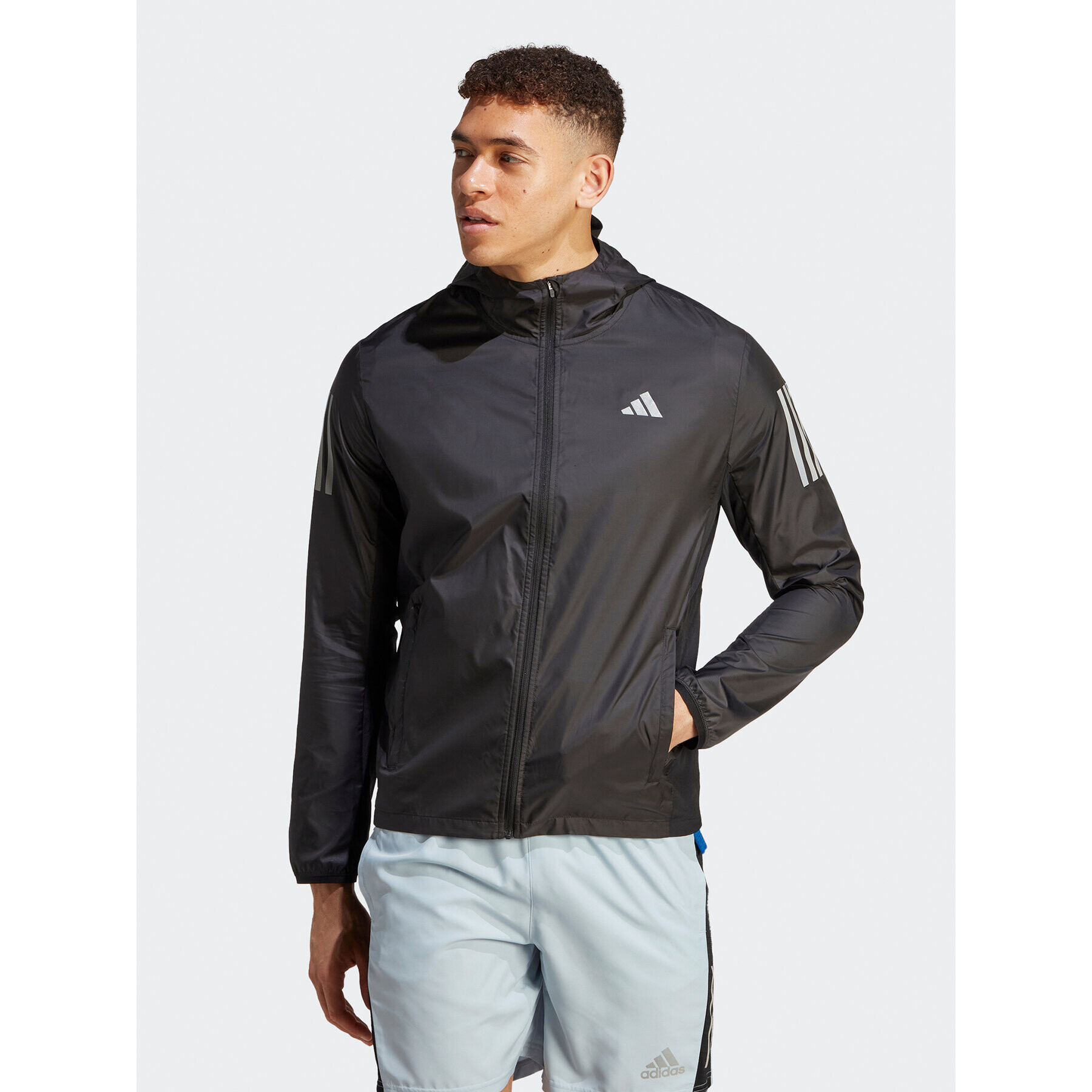 adidas Běžecká bunda Own the Run HZ4523 Černá Slim Fit - Pepit.cz