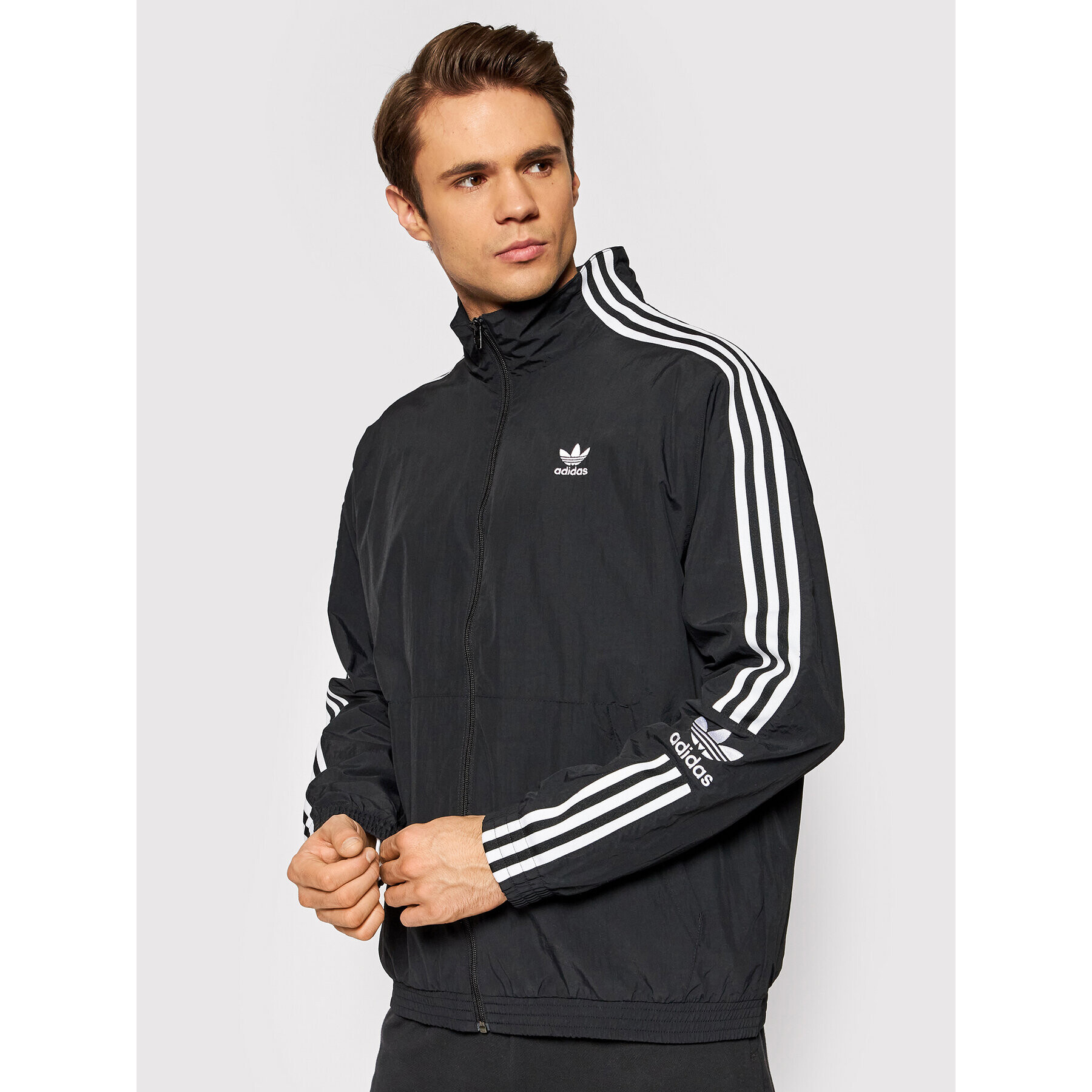 adidas Bunda pro přechodné období adicolor Classics Lock-Up Trefoil Track H41391 Černá Loose Fit - Pepit.cz