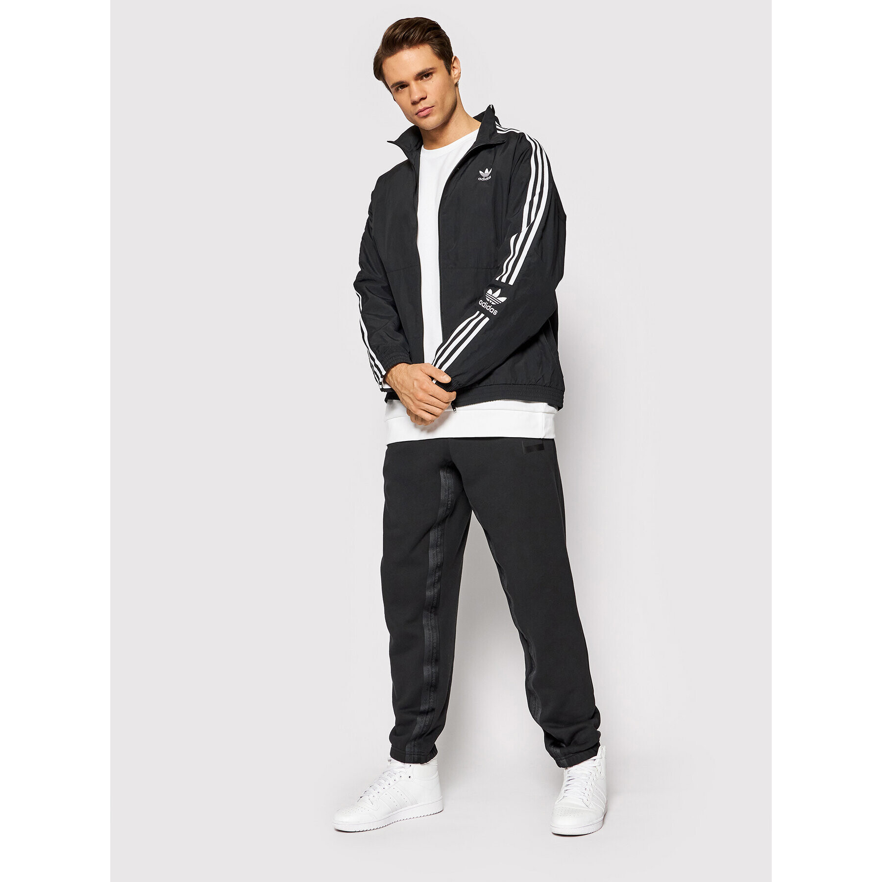 adidas Bunda pro přechodné období adicolor Classics Lock-Up Trefoil Track H41391 Černá Loose Fit - Pepit.cz