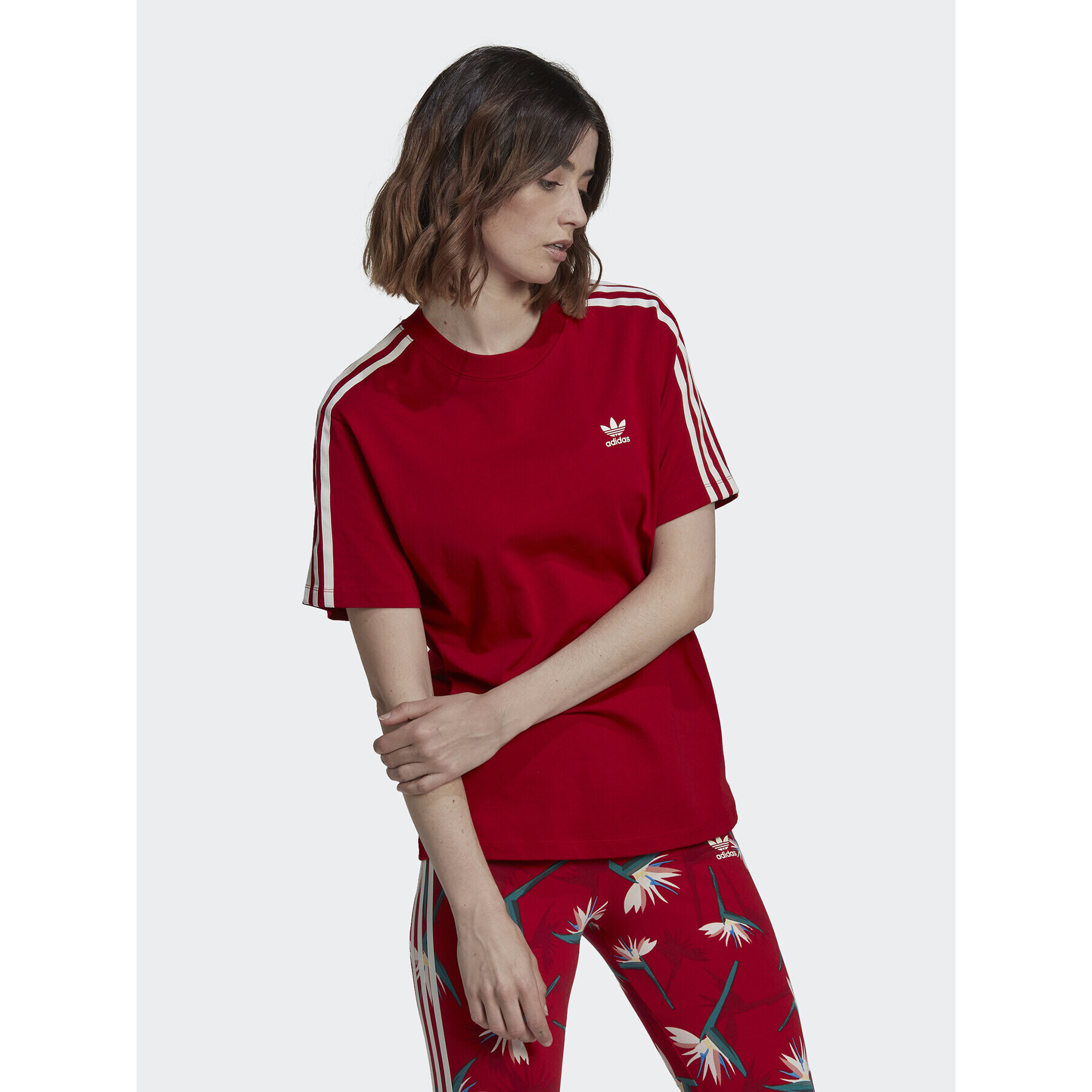 adidas T-Shirt THEBE MAGUGU HK5209 Červená Regular Fit - Pepit.cz