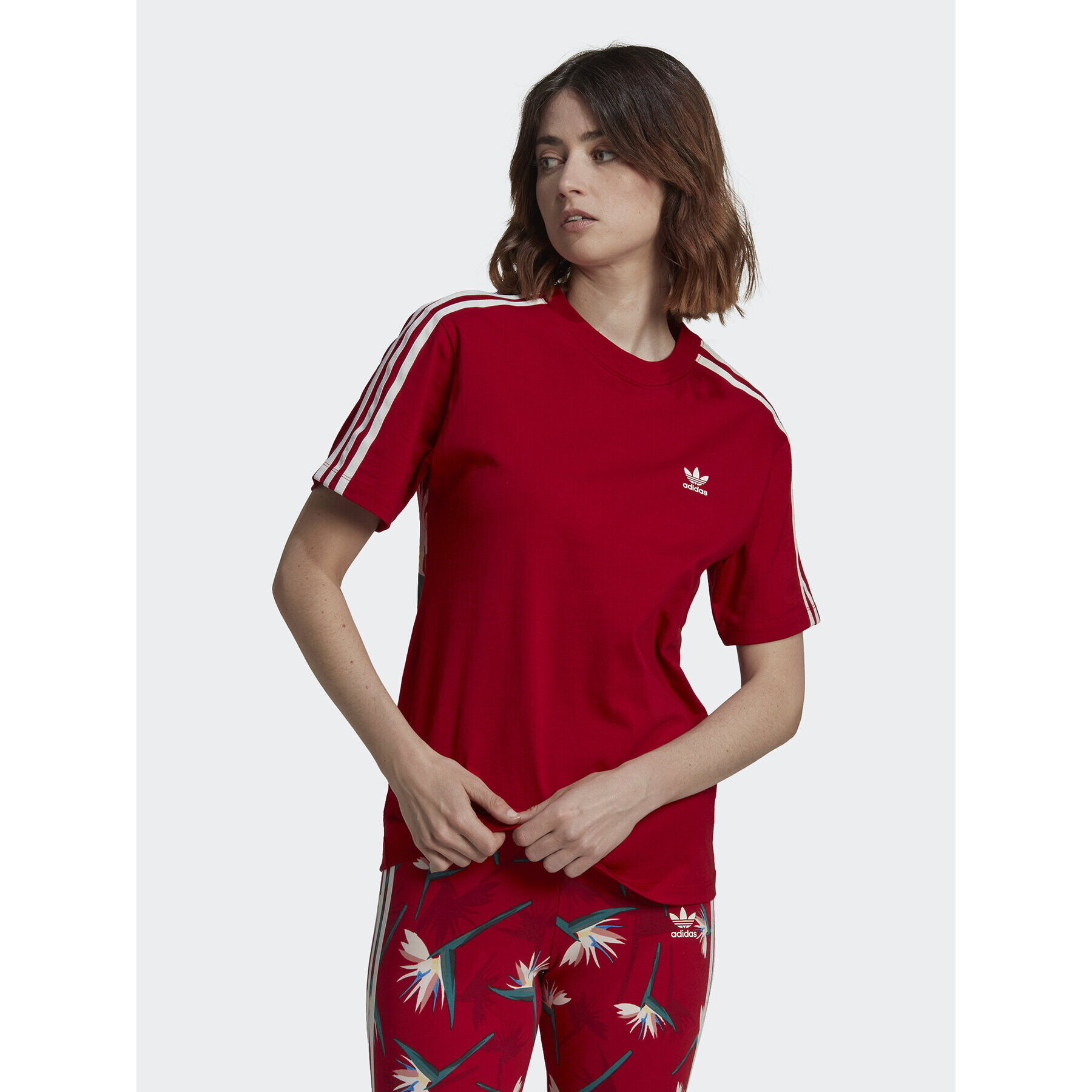 adidas T-Shirt THEBE MAGUGU HK5209 Červená Regular Fit - Pepit.cz