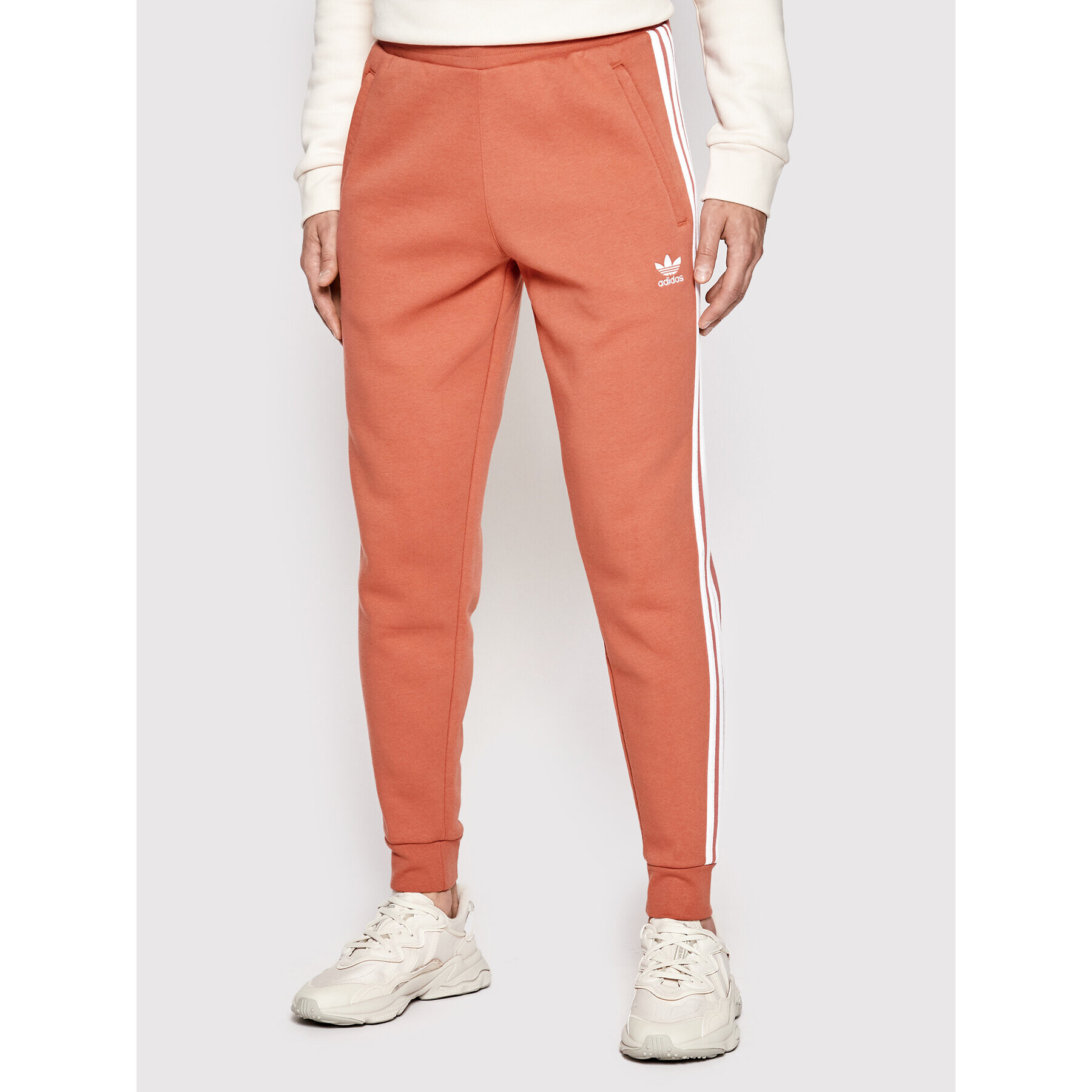 adidas Teplákové kalhoty adicolor Classics 3-Stripes HK7300 Oranžová Slim Fit - Pepit.cz