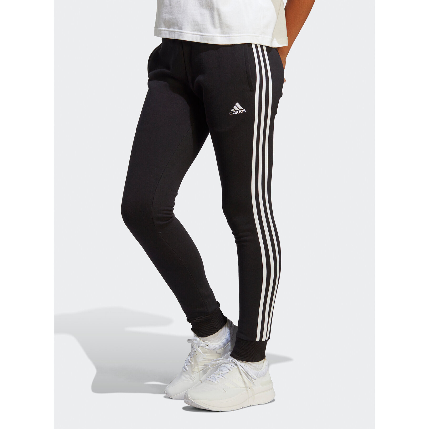 adidas Teplákové kalhoty Essentials 3-Stripes French Terry Cuffed Joggers IC8770 Černá Slim Fit - Pepit.cz