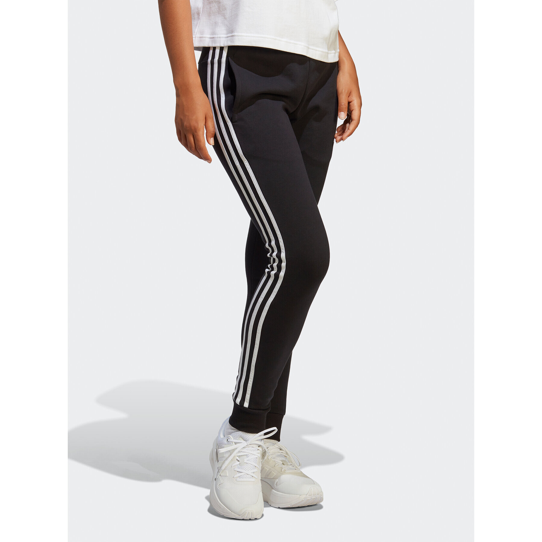 adidas Teplákové kalhoty Essentials 3-Stripes French Terry Cuffed Joggers IC8770 Černá Slim Fit - Pepit.cz