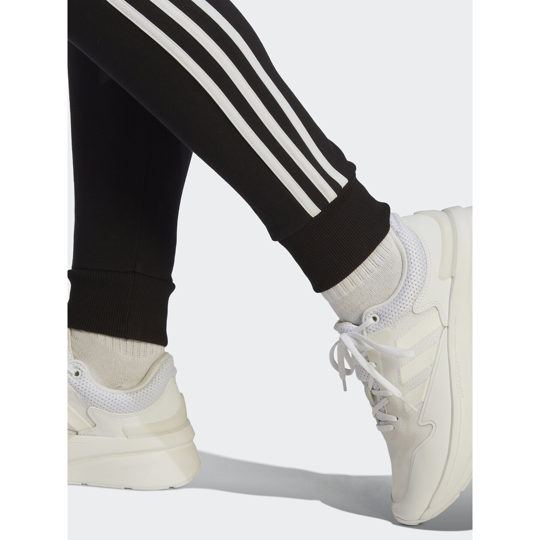 adidas Teplákové kalhoty Essentials 3-Stripes French Terry Cuffed Joggers IC8770 Černá Slim Fit - Pepit.cz