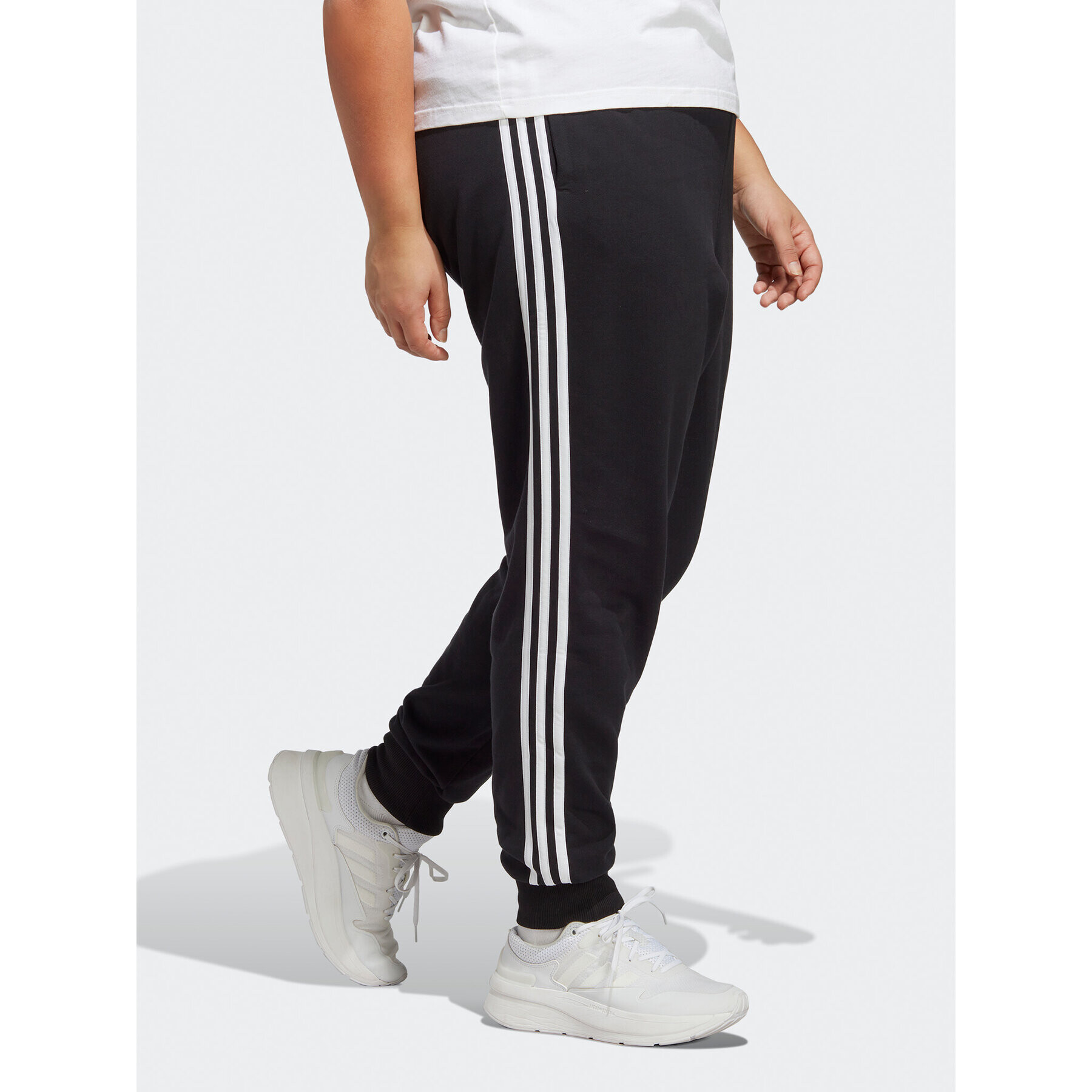 adidas Teplákové kalhoty Essentials 3-Stripes French Terry Cuffed Joggers (Plus Size) IB8745 Černá Slim Fit - Pepit.cz