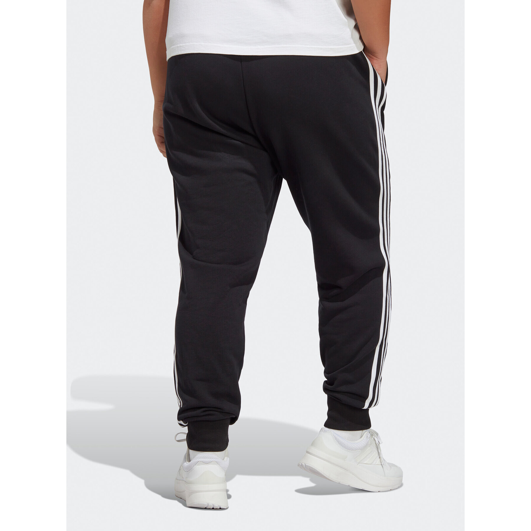 adidas Teplákové kalhoty Essentials 3-Stripes French Terry Cuffed Joggers (Plus Size) IB8745 Černá Slim Fit - Pepit.cz