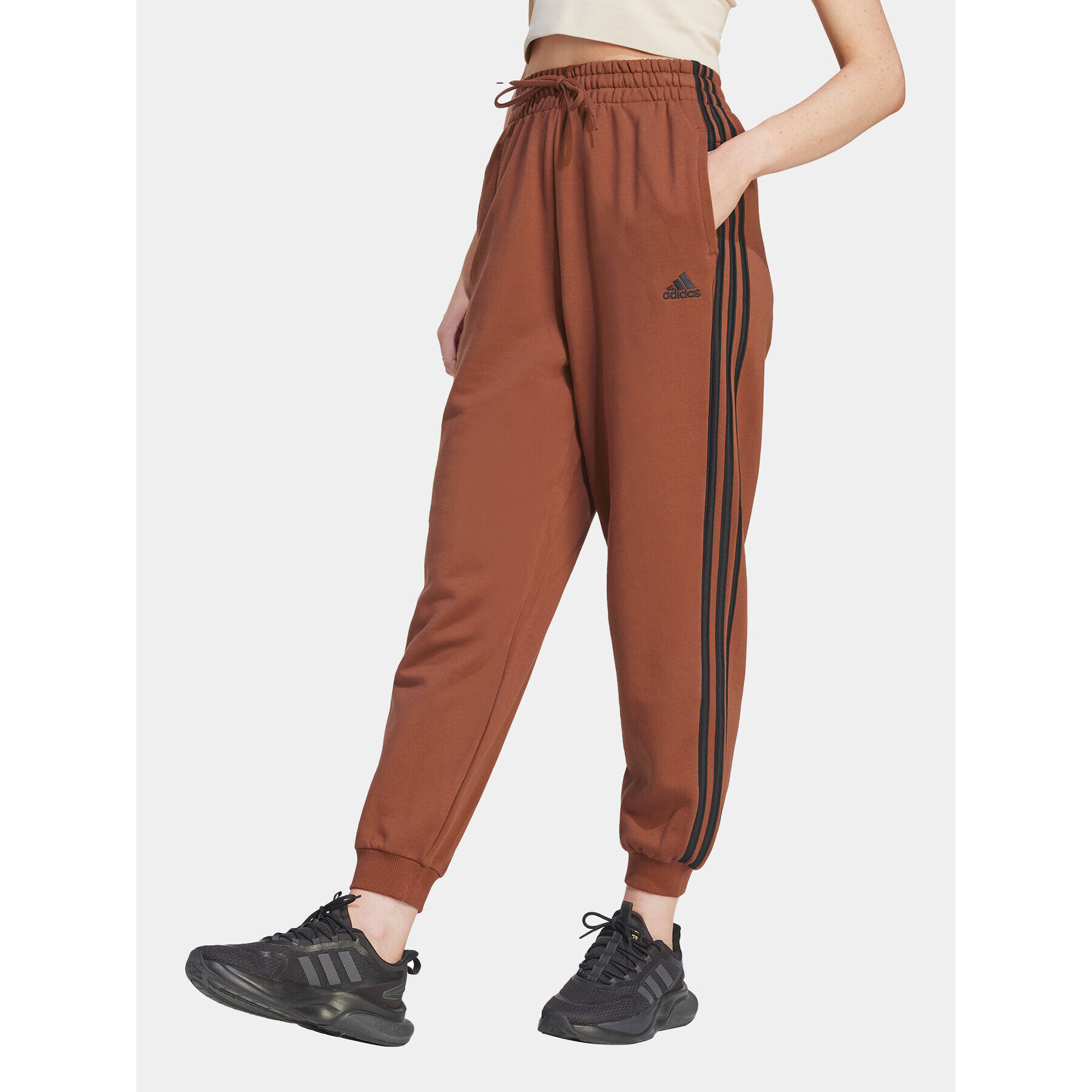 adidas Teplákové kalhoty Essentials 3-Stripes IL3451 Hnědá Loose Fit - Pepit.cz