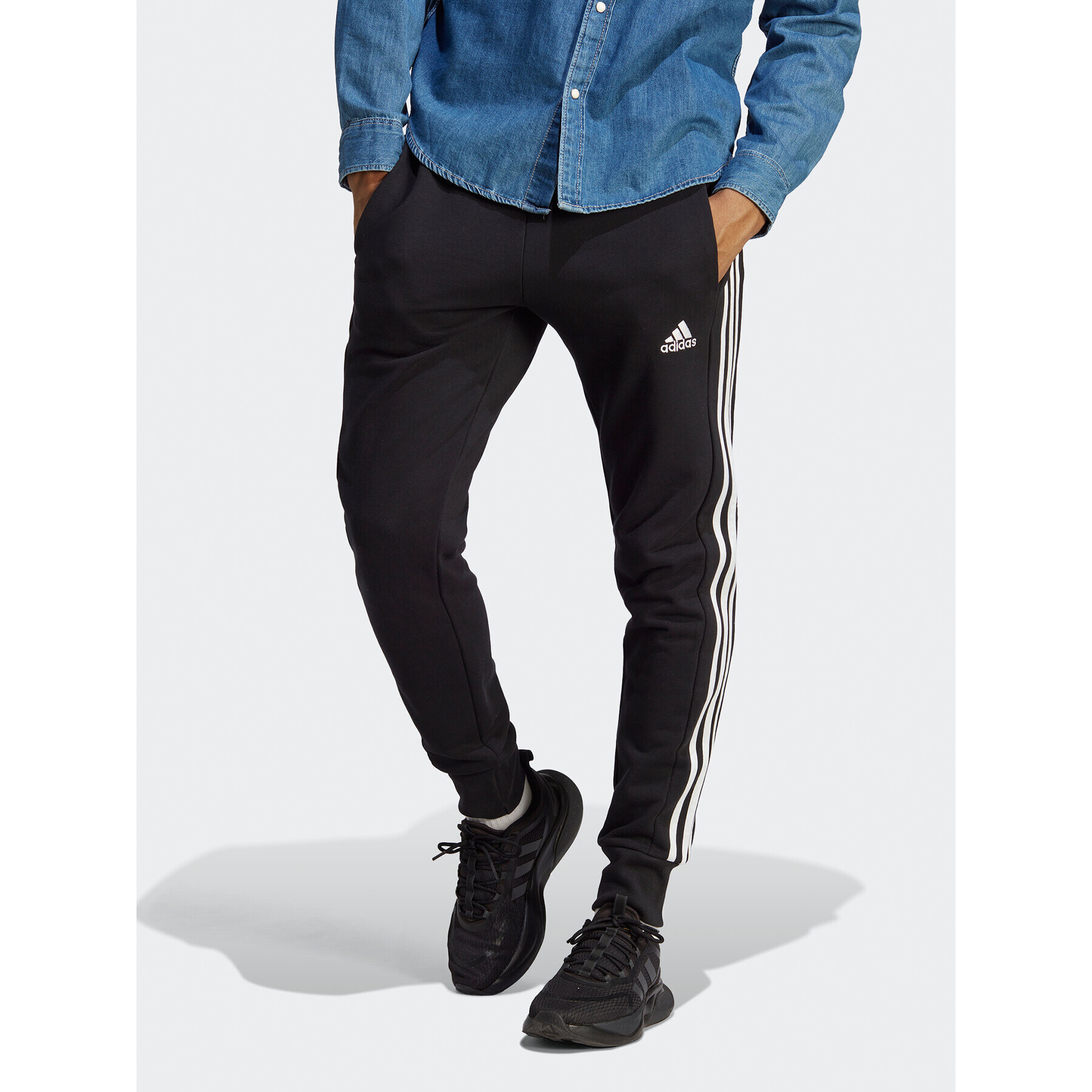 adidas Teplákové kalhoty Essentials French Terry Tapered Cuff 3-Stripes Joggers HA4337 Černá Regular Fit - Pepit.cz