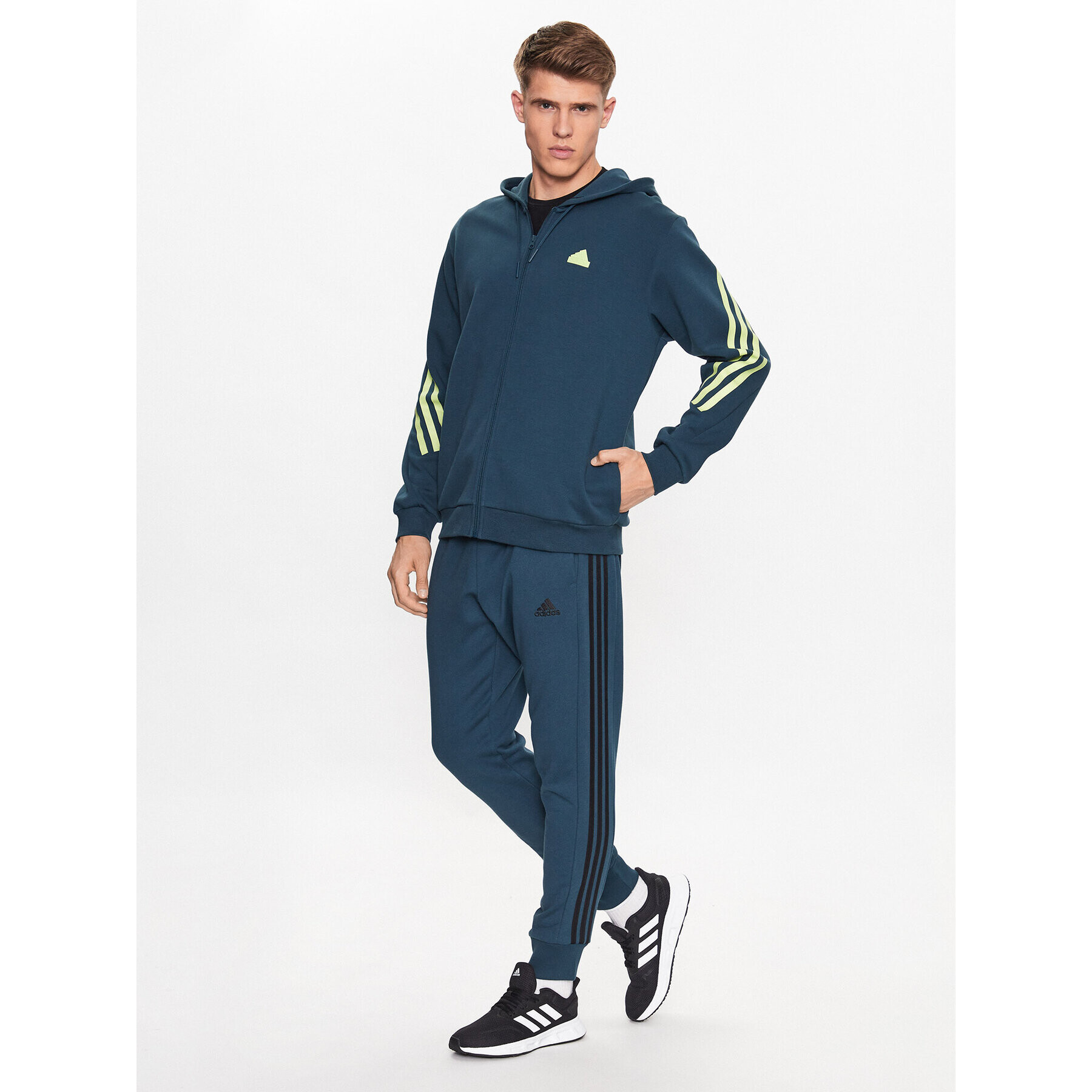 adidas Teplákové kalhoty Essentials French Terry Tapered Cuff 3-Stripes Joggers IJ8698 Tyrkysová Regular Fit - Pepit.cz