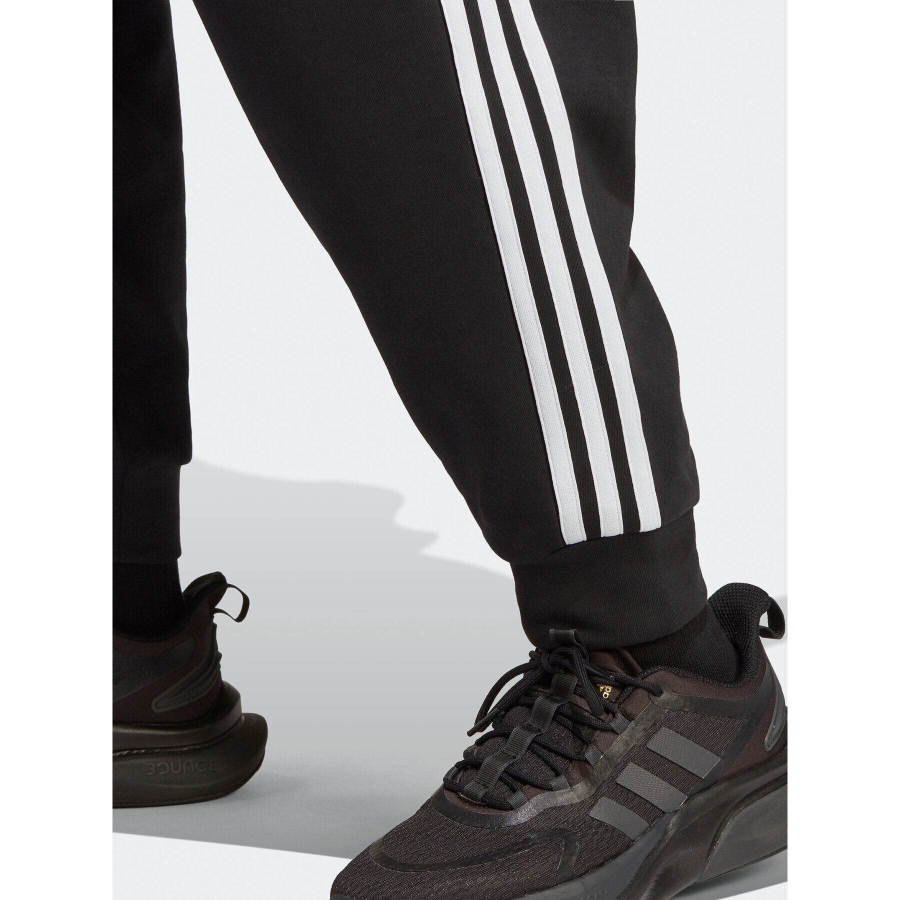 adidas Teplákové kalhoty Future Icons 3-Stripes Regular Tracksuit Bottoms (Plus Size) HT4703 Černá Regular Fit - Pepit.cz