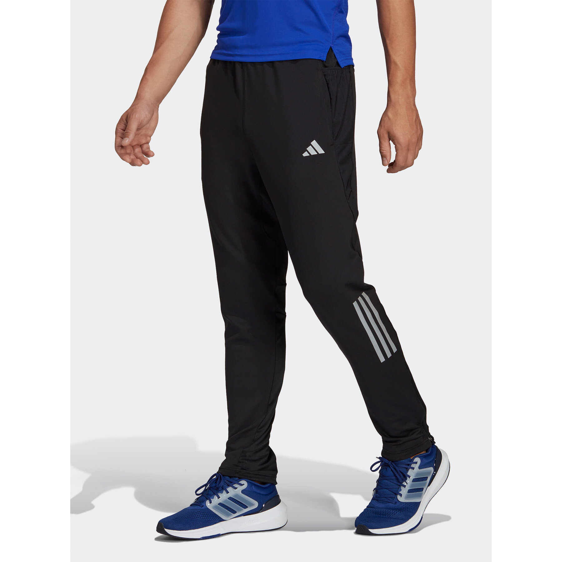 adidas Teplákové kalhoty Own the Run Astro Knit Joggers HN0806 Černá Regular Fit - Pepit.cz