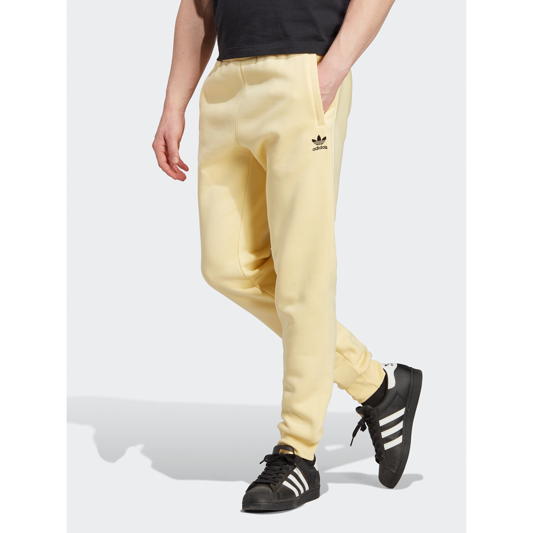 adidas Teplákové kalhoty Trefoil Essentials Joggers IA4831 Žlutá Slim Fit - Pepit.cz