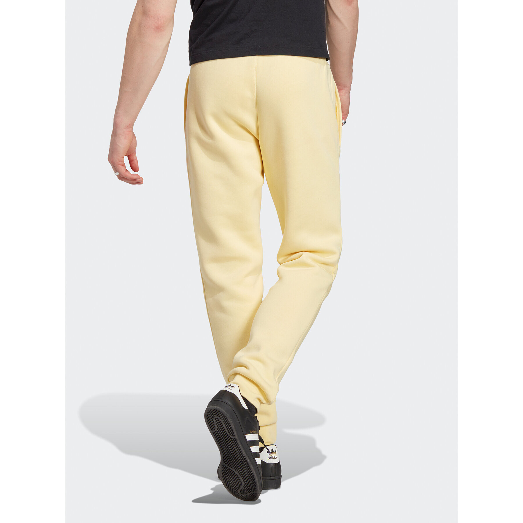 adidas Teplákové kalhoty Trefoil Essentials Joggers IA4831 Žlutá Slim Fit - Pepit.cz