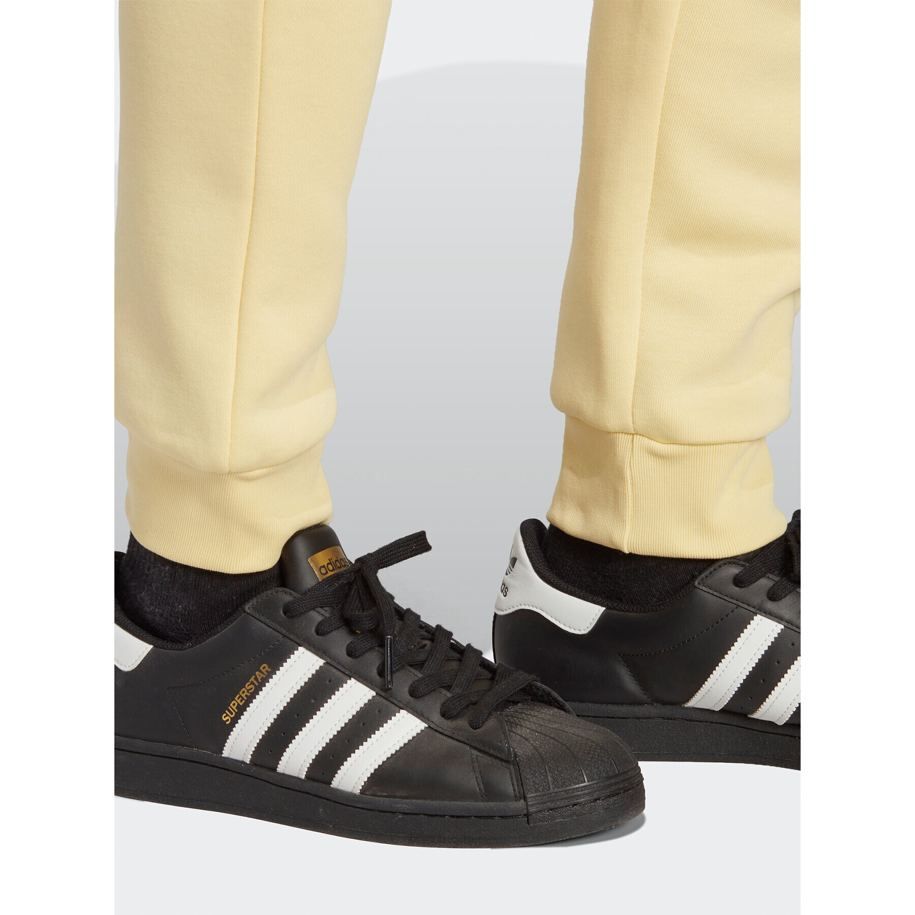 adidas Teplákové kalhoty Trefoil Essentials Joggers IA4831 Žlutá Slim Fit - Pepit.cz