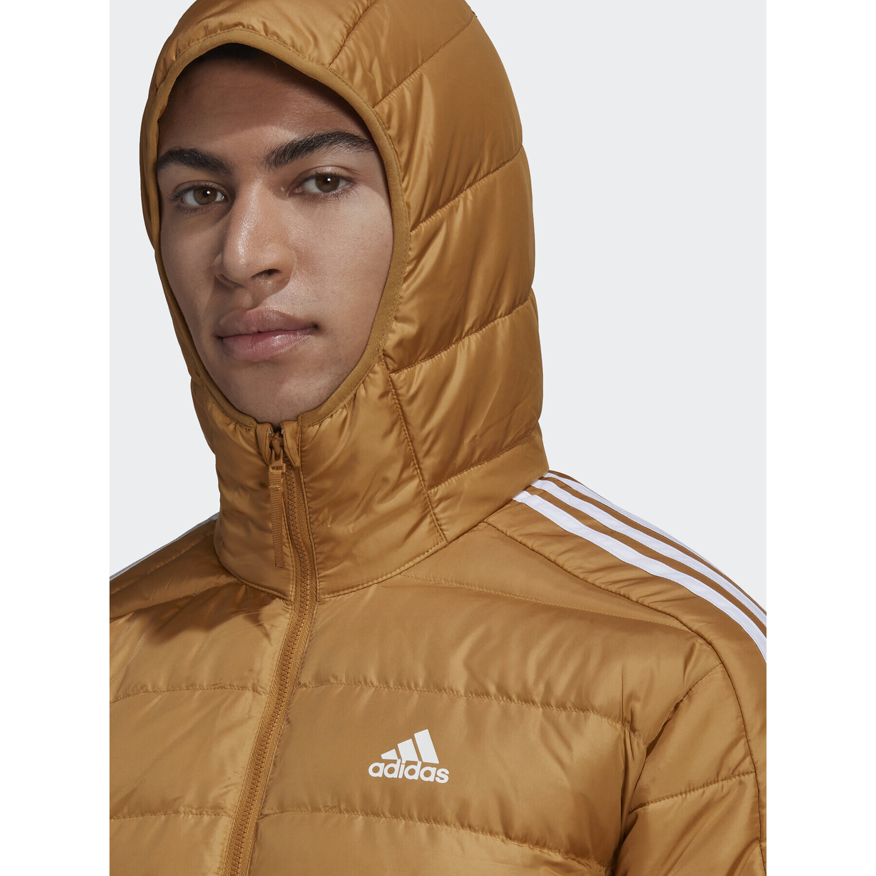 adidas Vatovaná bunda Essentials Down HK4644 Žlutá Slim Fit - Pepit.cz