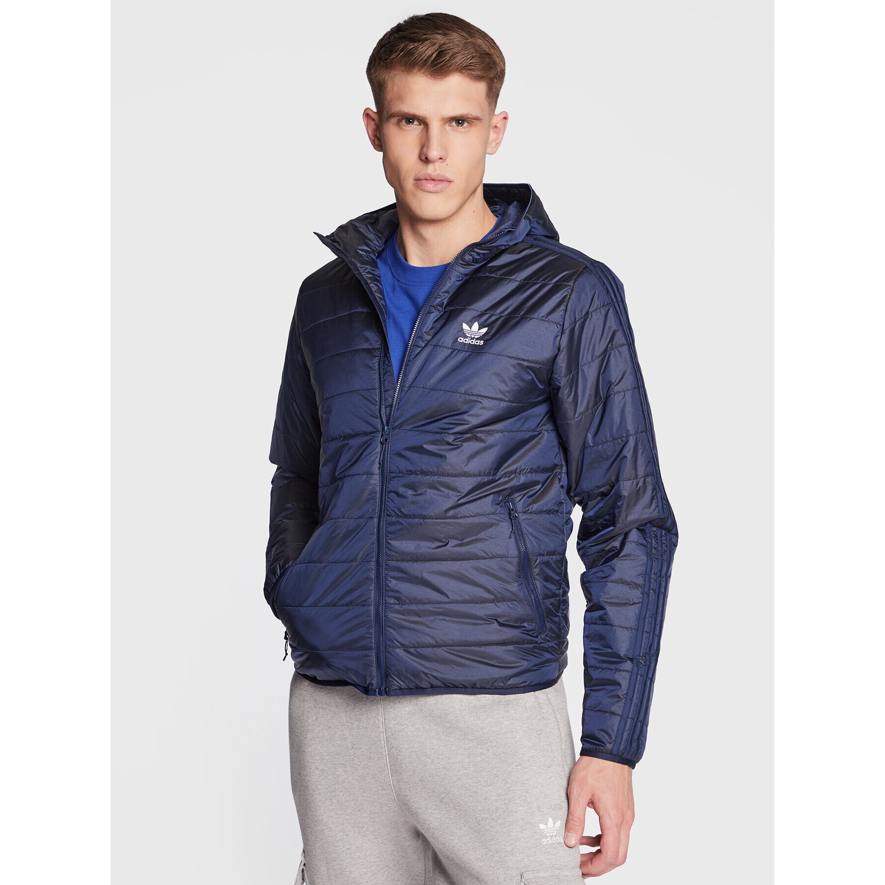 adidas Bunda pro přechodné období Padded Hooded Puffer Jacket HL9210 Modrá Regular Fit - Pepit.cz