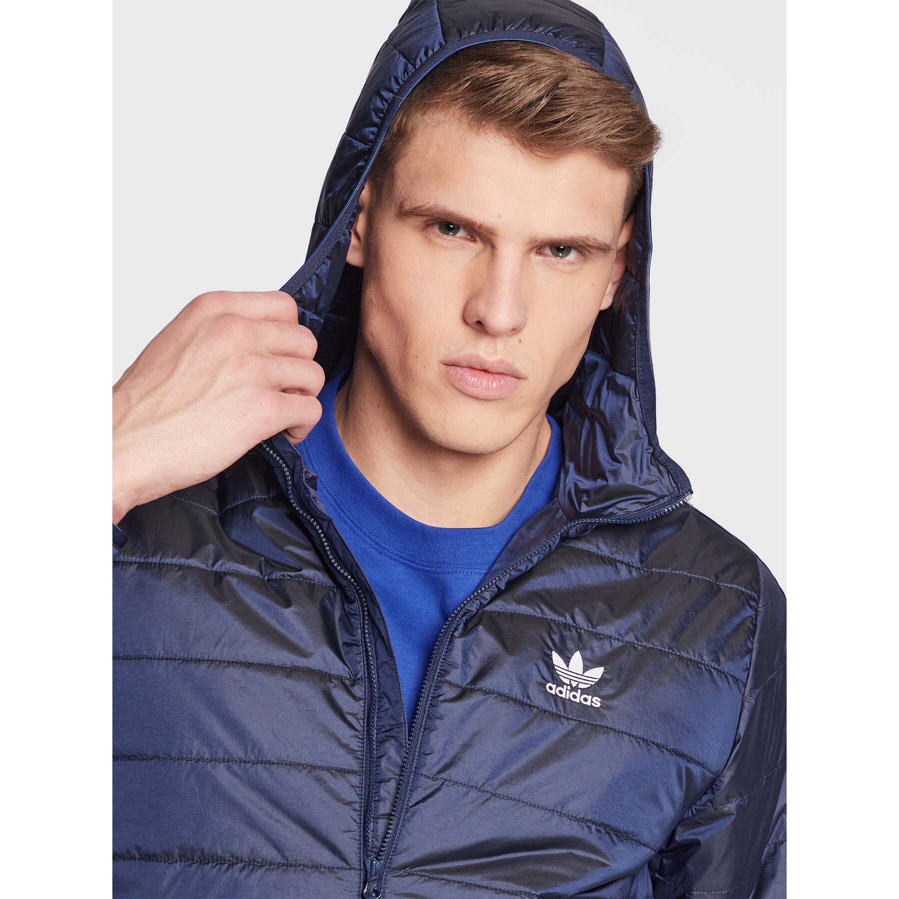 adidas Bunda pro přechodné období Padded Hooded Puffer Jacket HL9210 Modrá Regular Fit - Pepit.cz