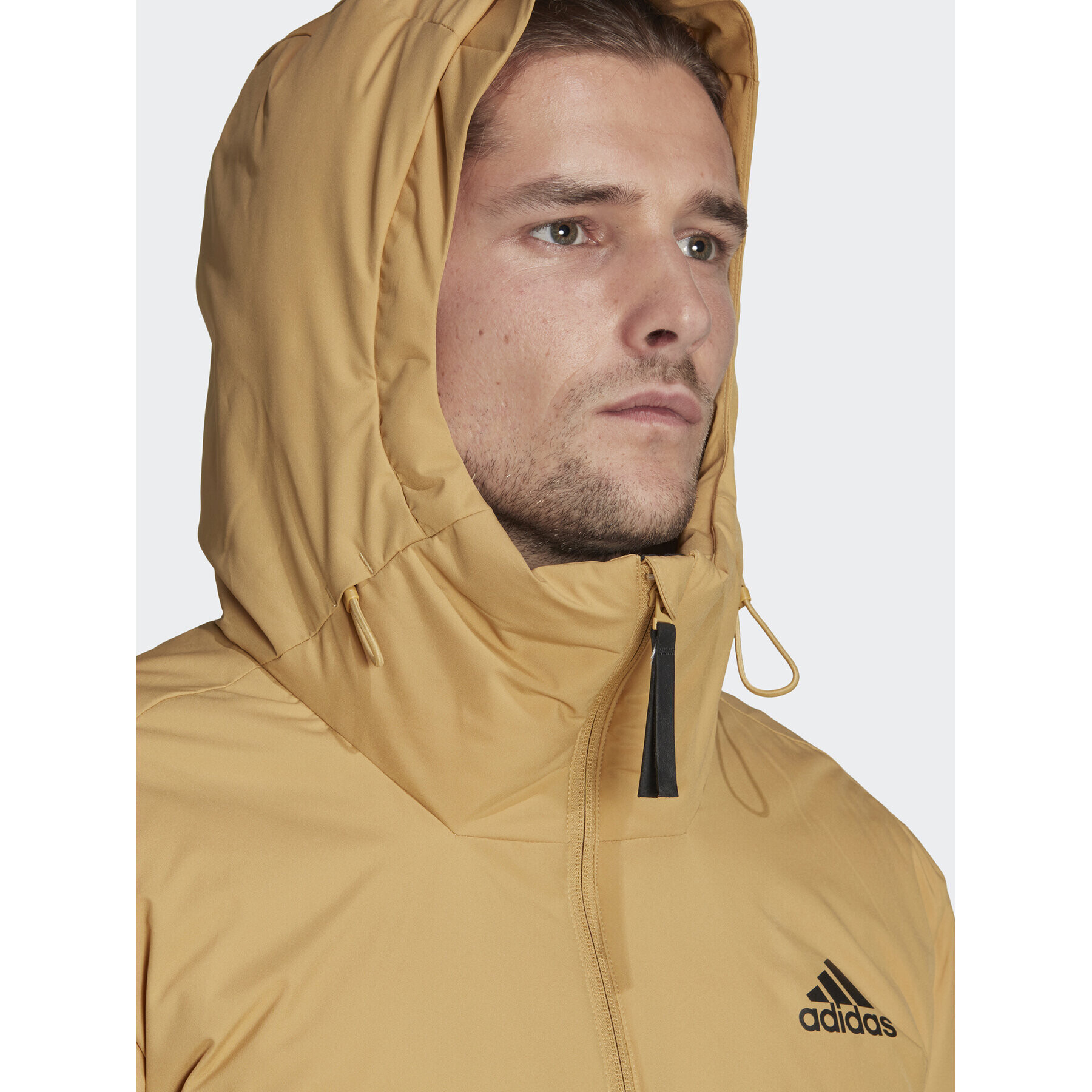 adidas Vatovaná bunda Traveer HD8901 Béžová Regular Fit - Pepit.cz