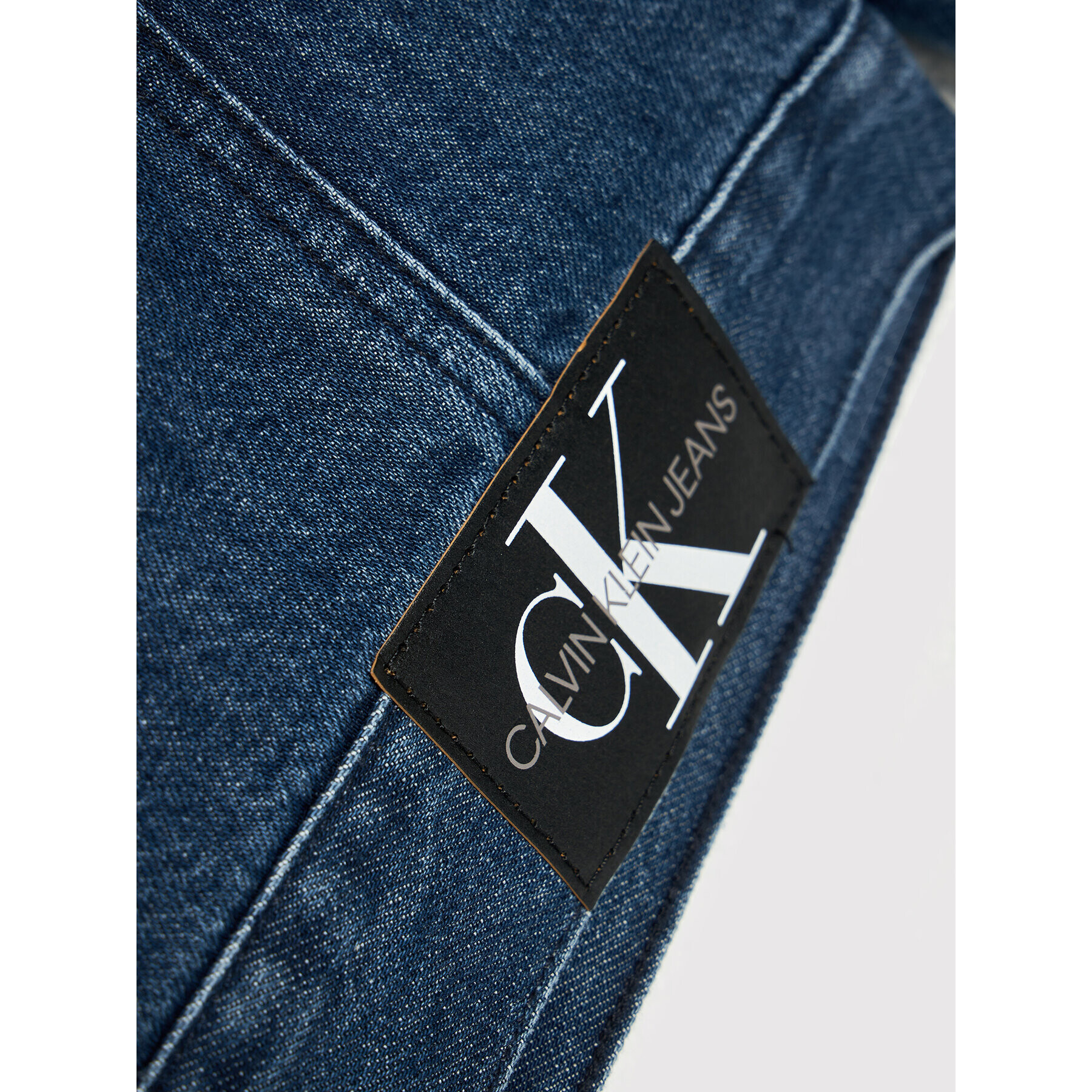 Calvin Klein Jeans Bunda pro přechodné období IB0IB00917 Tmavomodrá Regular Fit - Pepit.cz