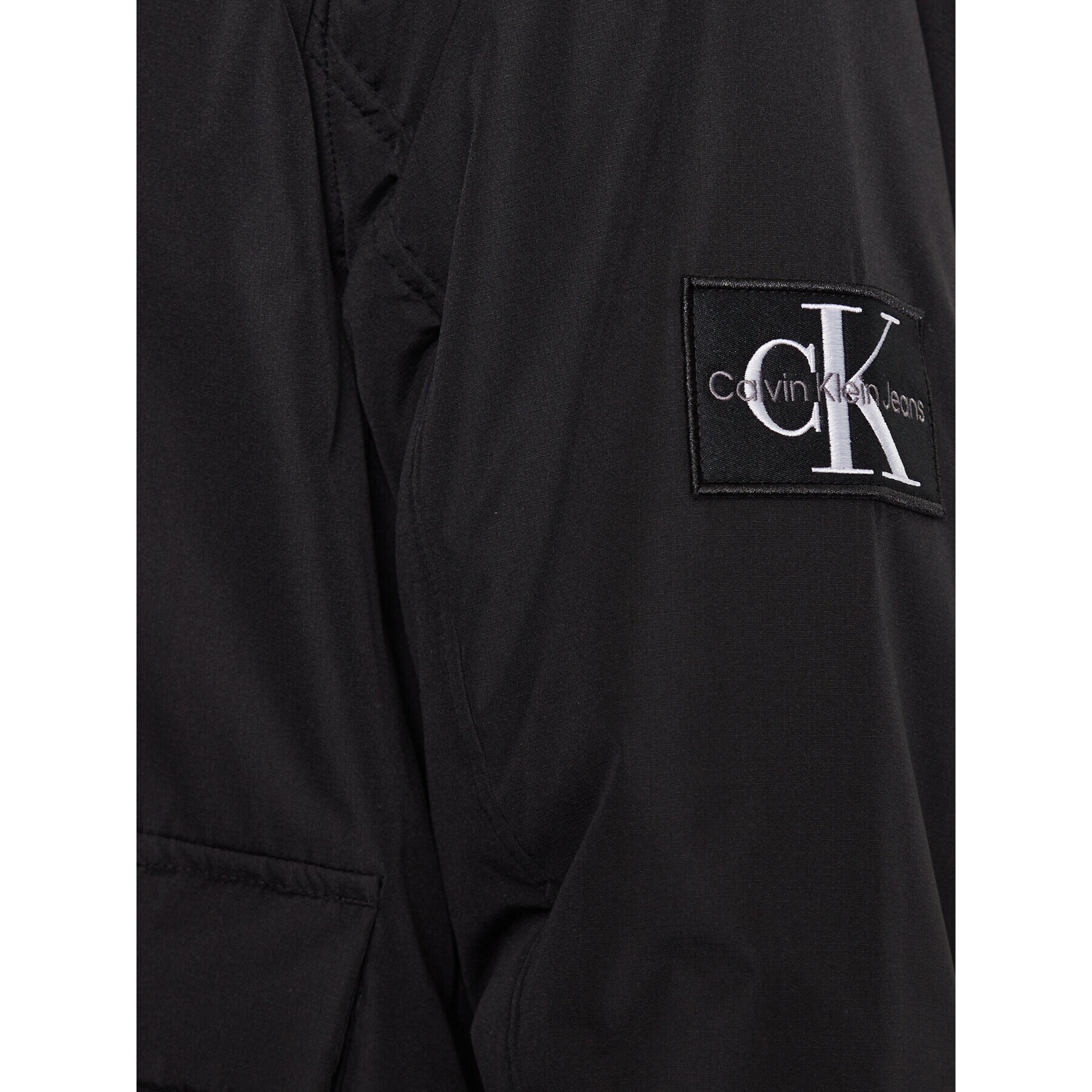 Calvin Klein Jeans Bunda pro přechodné období J30J323467 Černá Regular Fit - Pepit.cz