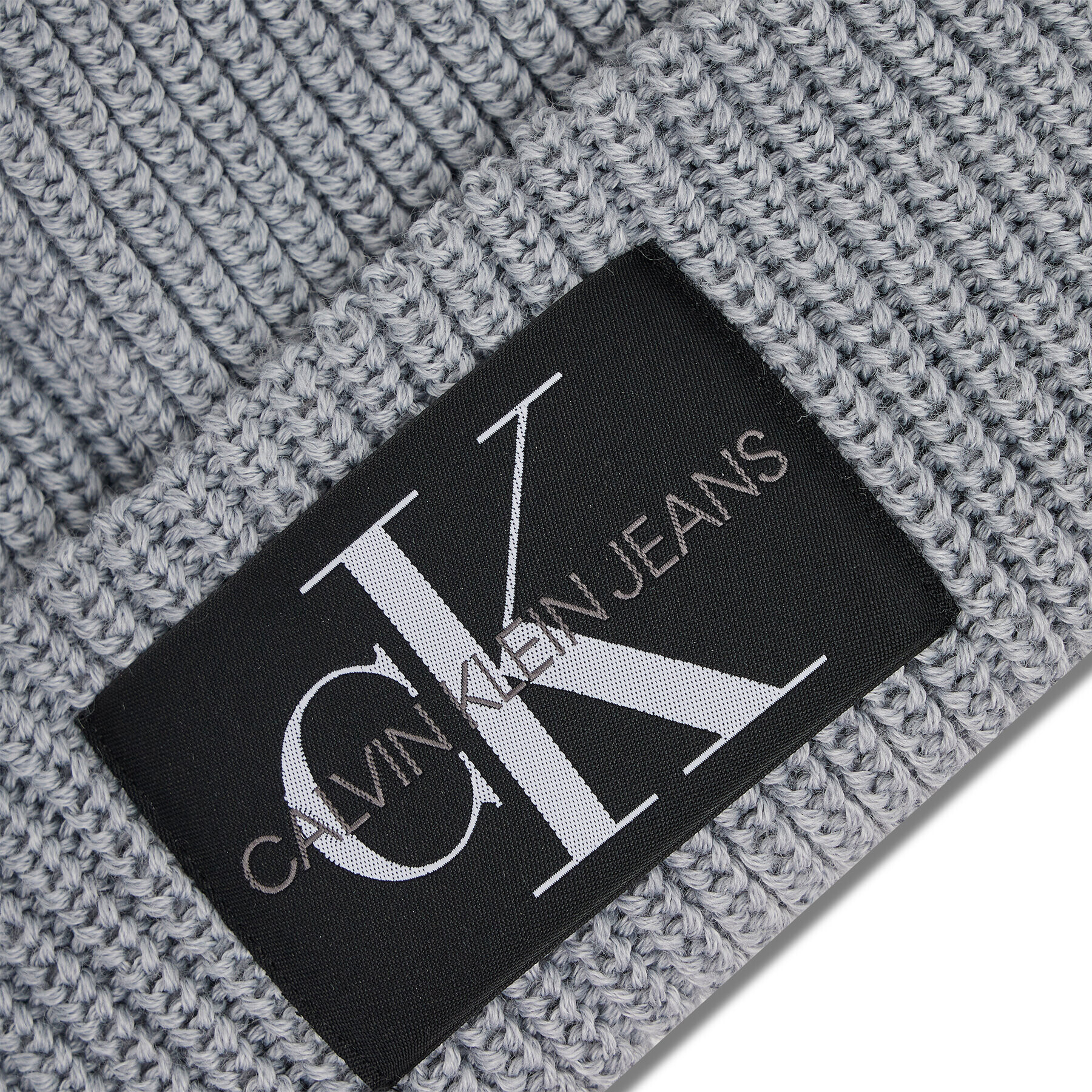 Calvin Klein Jeans Čepice Monogram Beanie Wl K60K607383 Šedá - Pepit.cz