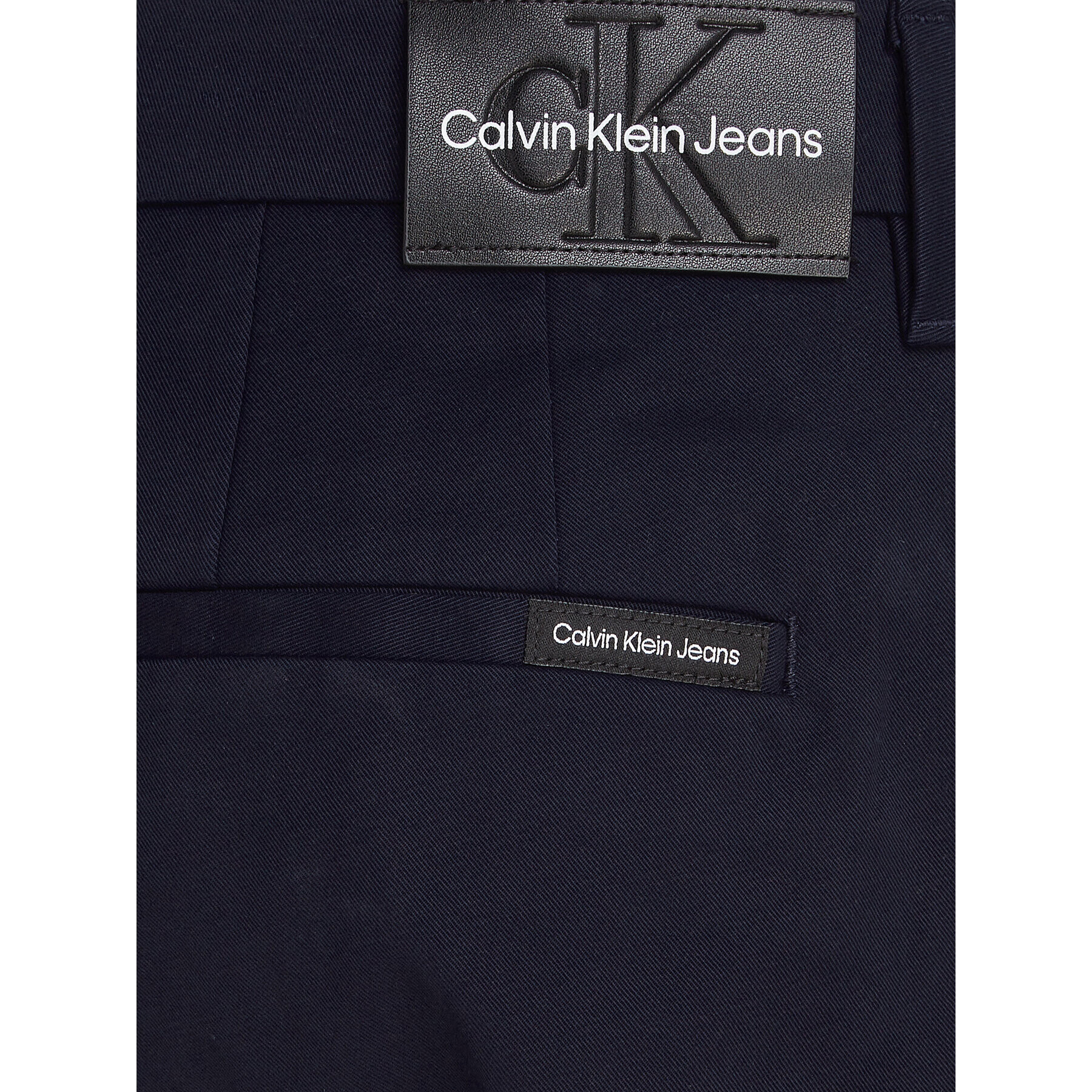 Calvin Klein Jeans Chino kalhoty J30J317669 Tmavomodrá Slim Fit - Pepit.cz