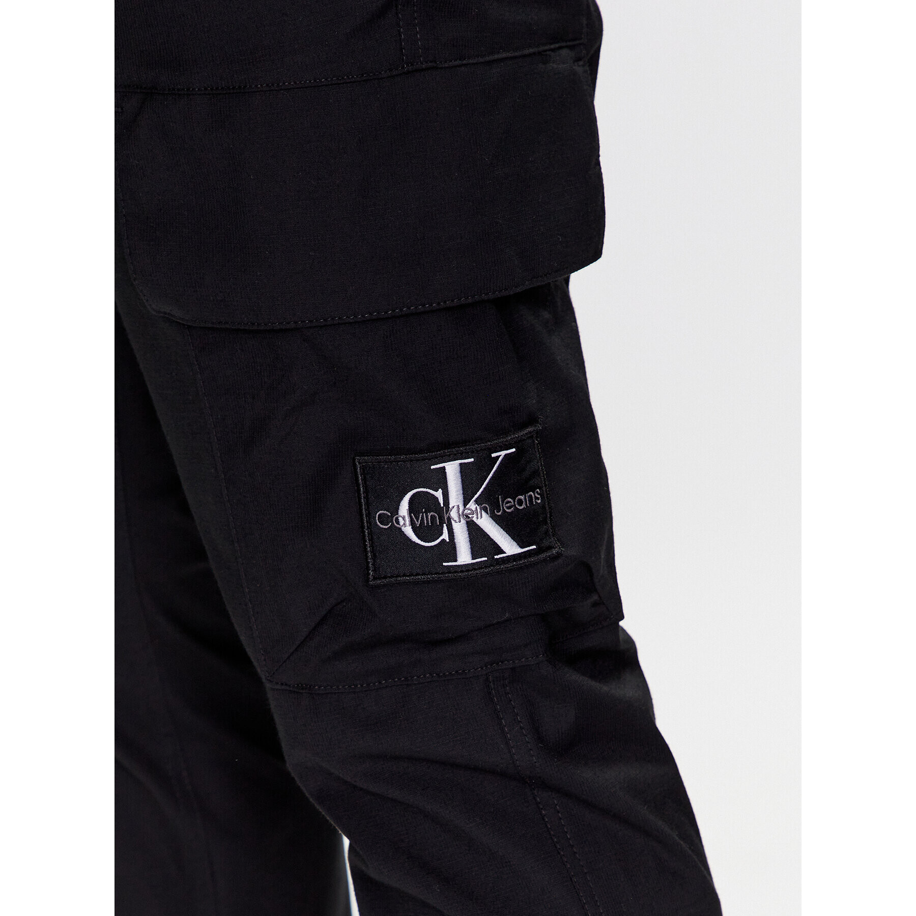 Calvin Klein Jeans Kalhoty z materiálu J30J322922 Černá Regular Fit - Pepit.cz