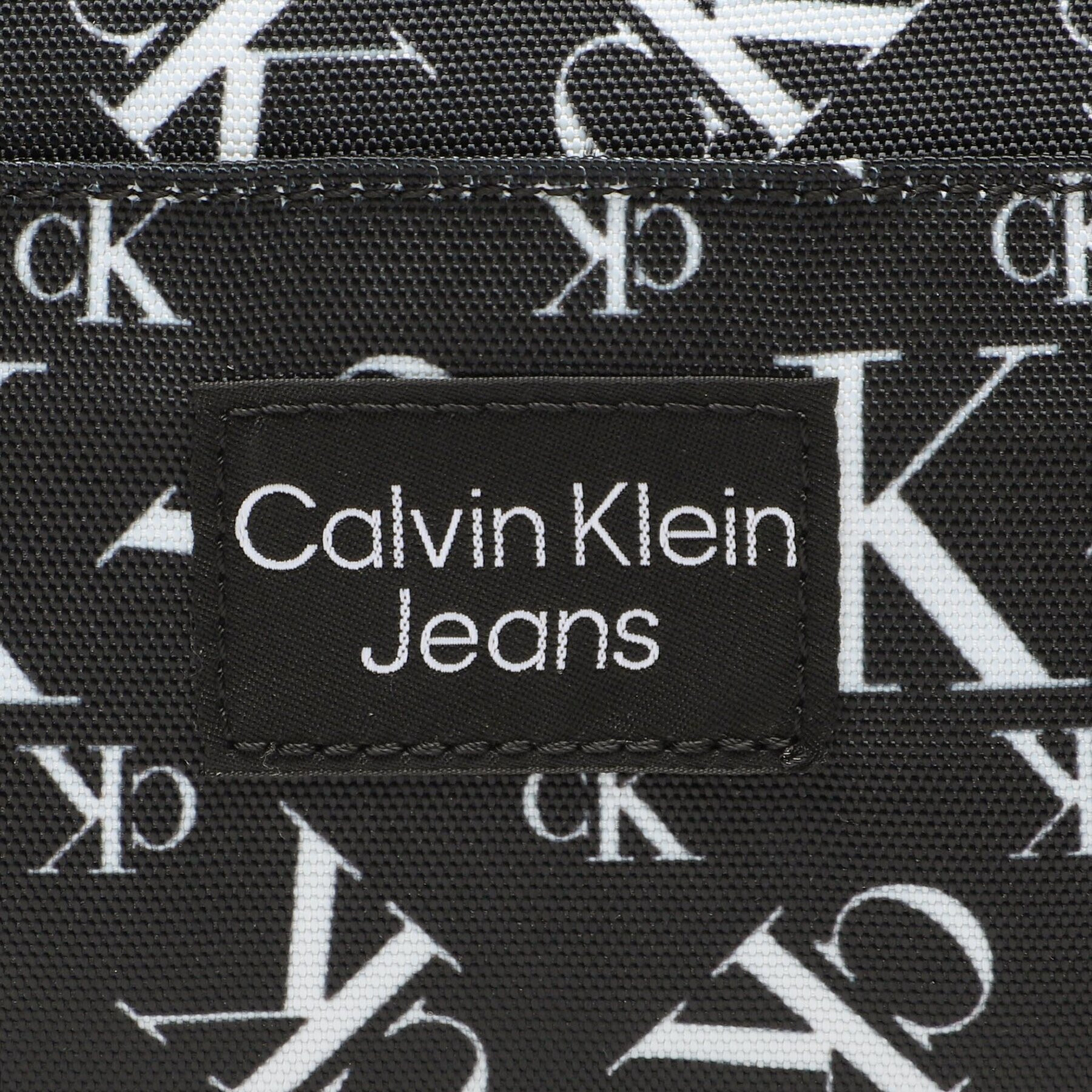 Calvin Klein Jeans Ledvinka Monogram Badge Waistabag U0IU00356 Černá - Pepit.cz