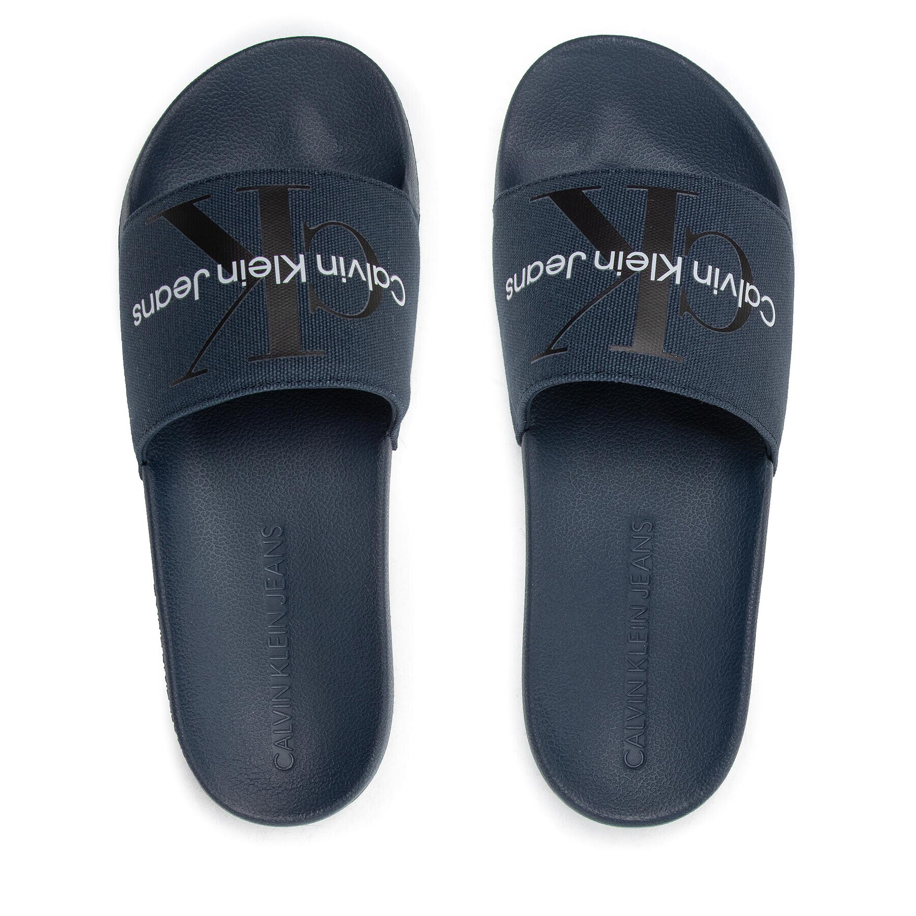 Calvin Klein Jeans Nazouváky SLide Monogram Co YM0YM00061 Tmavomodrá - Pepit.cz