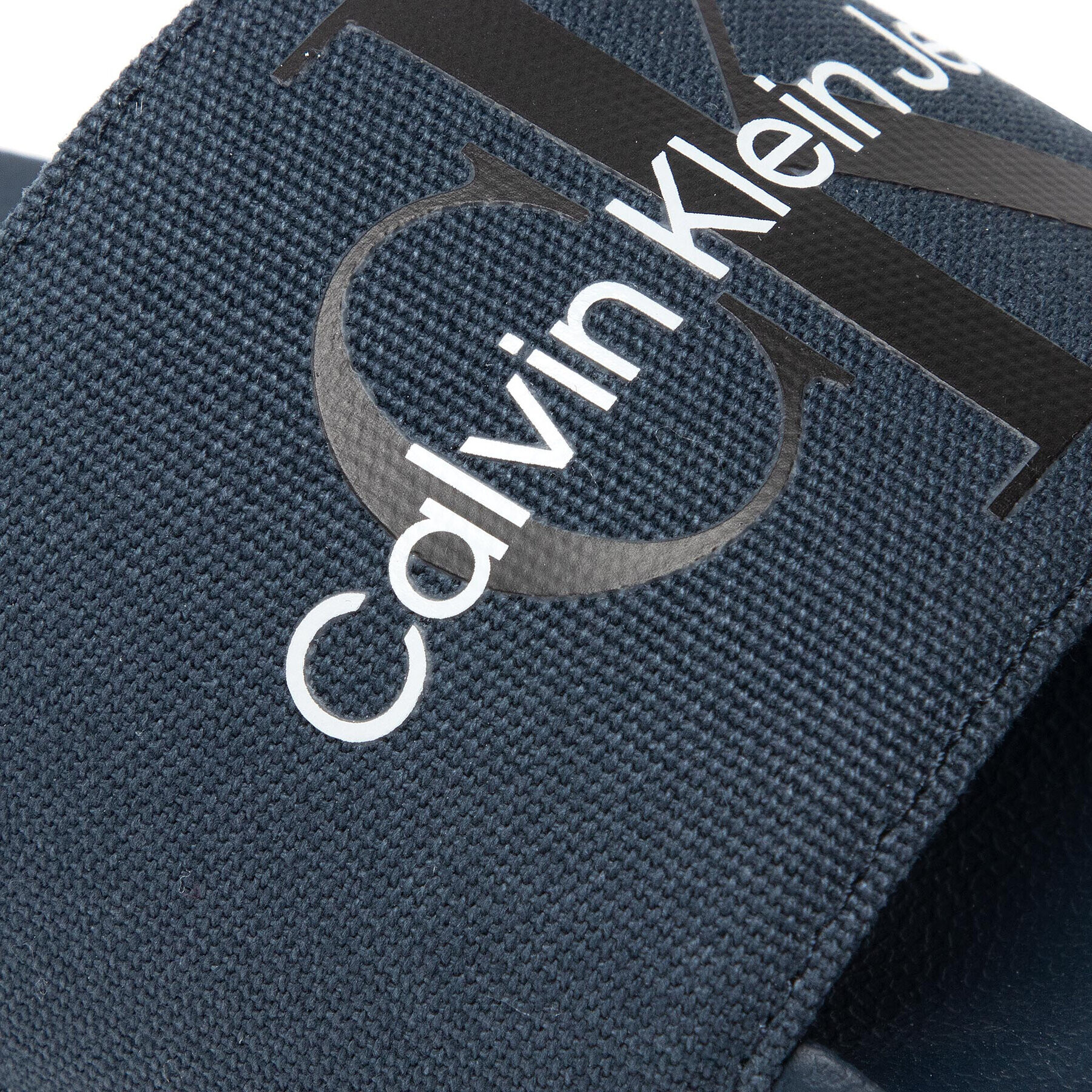 Calvin Klein Jeans Nazouváky SLide Monogram Co YM0YM00061 Tmavomodrá - Pepit.cz