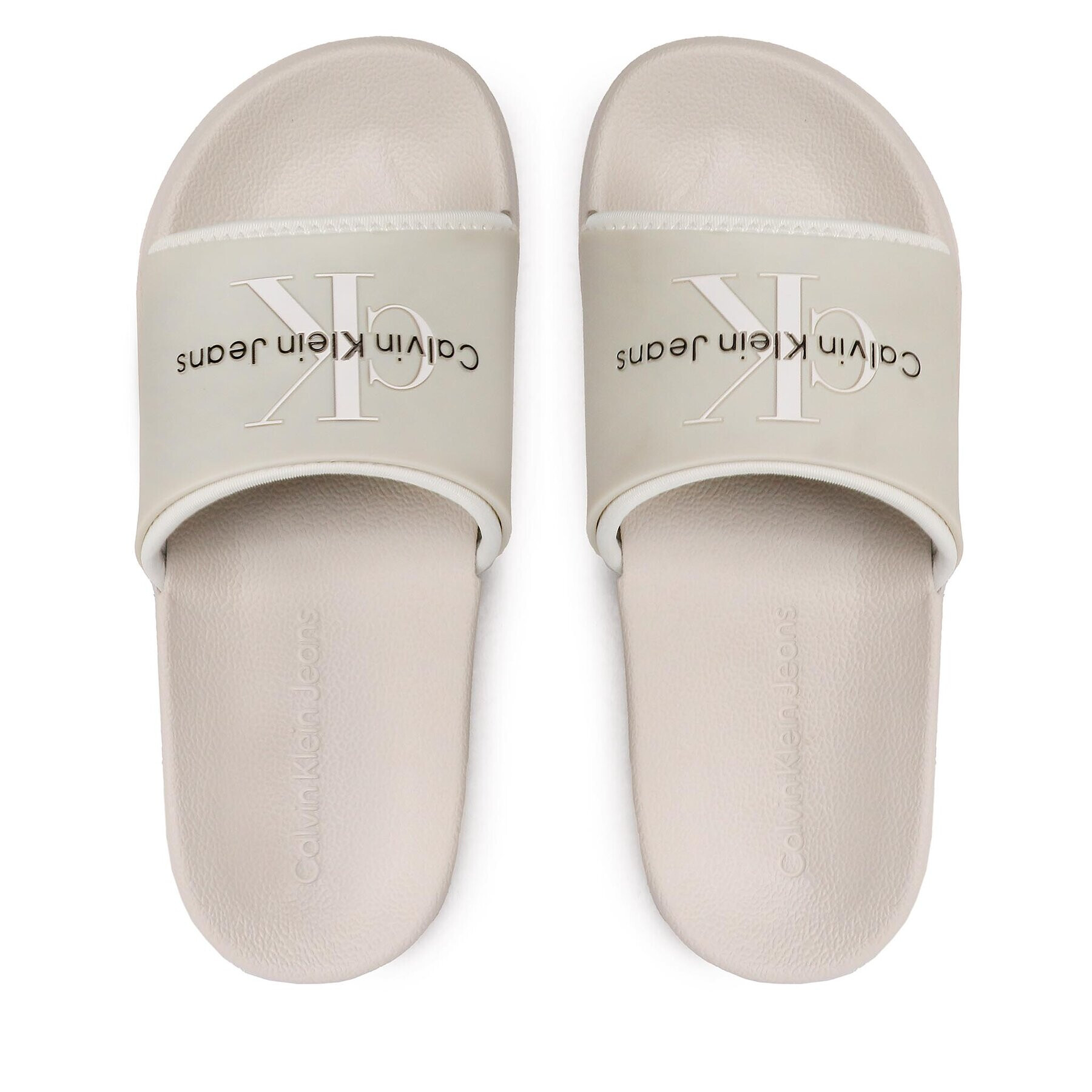 Calvin Klein Jeans Nazouváky Slide Monogram Tpu YW0YW00585 Béžová - Pepit.cz