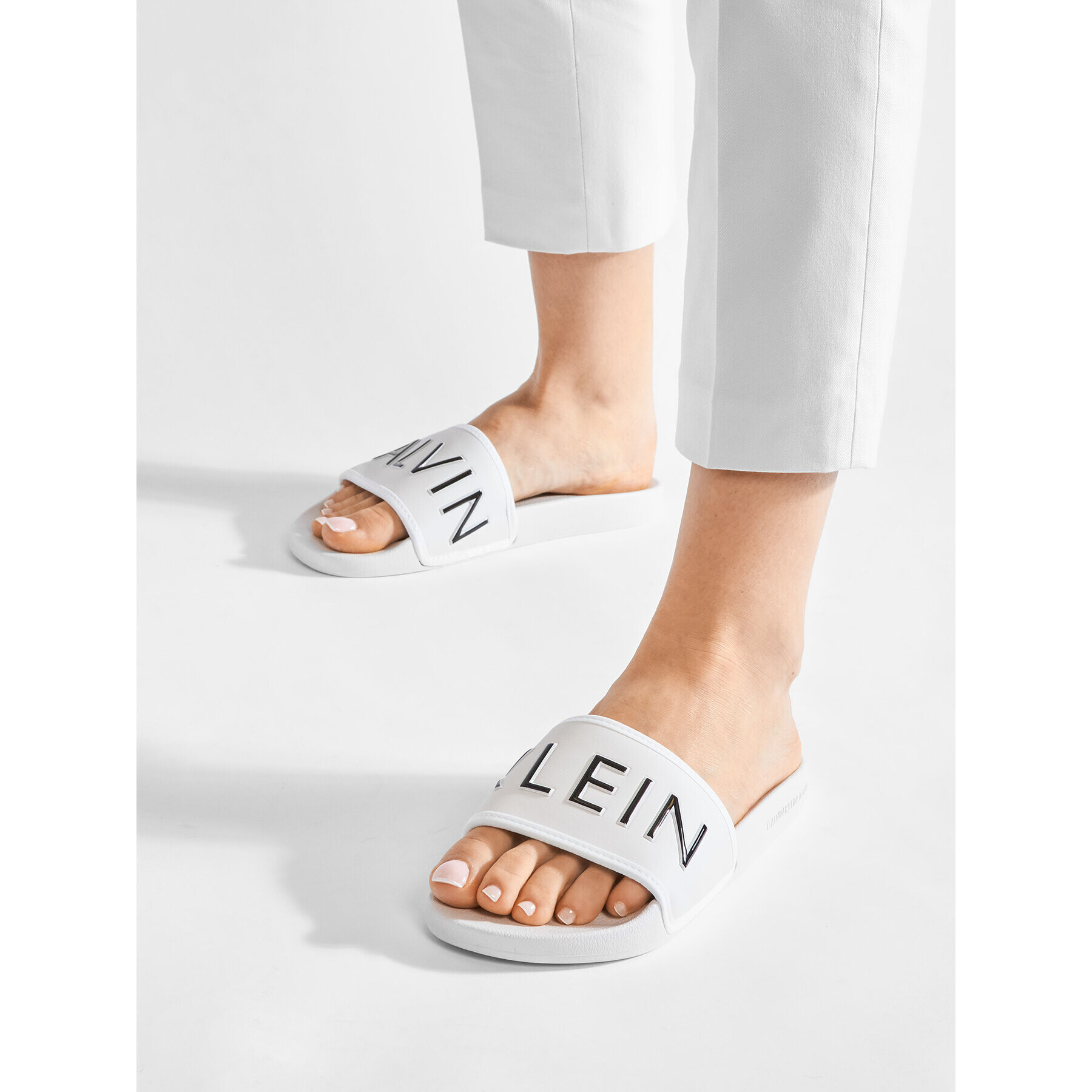 Calvin Klein Jeans Nazouváky Slide Padded Ck Pes-Pu YW0YW00131 Béžová - Pepit.cz