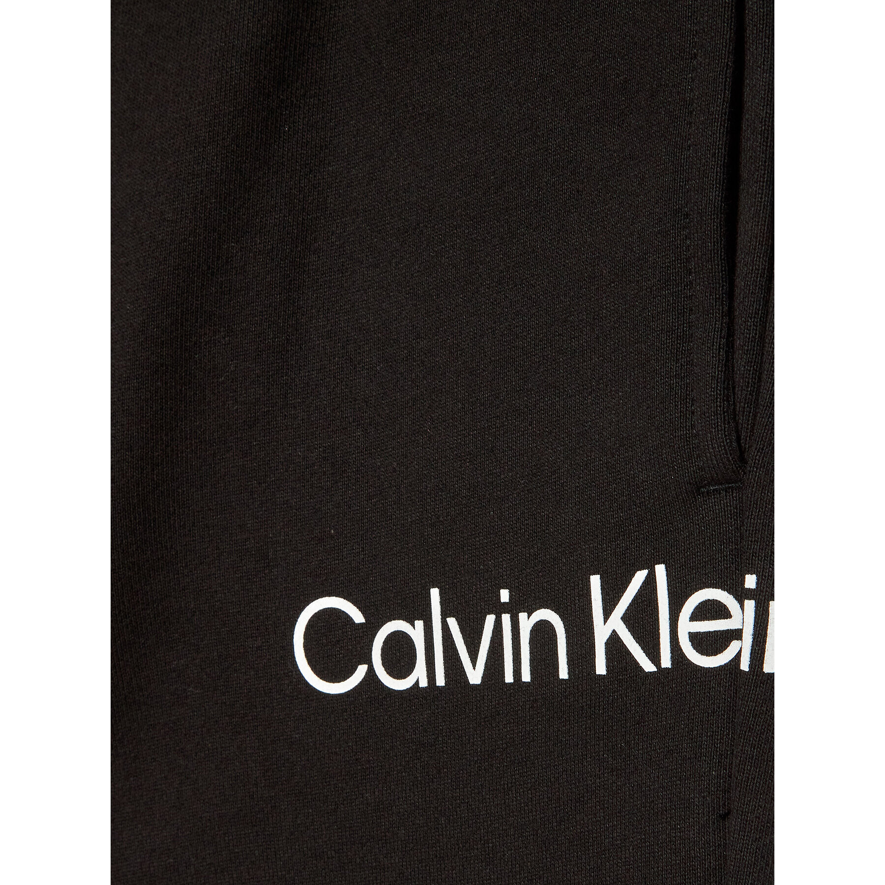 Calvin Klein Jeans Teplákové kalhoty Disrupted Inst. Logo IU0IU00323 Černá Regular Fit - Pepit.cz