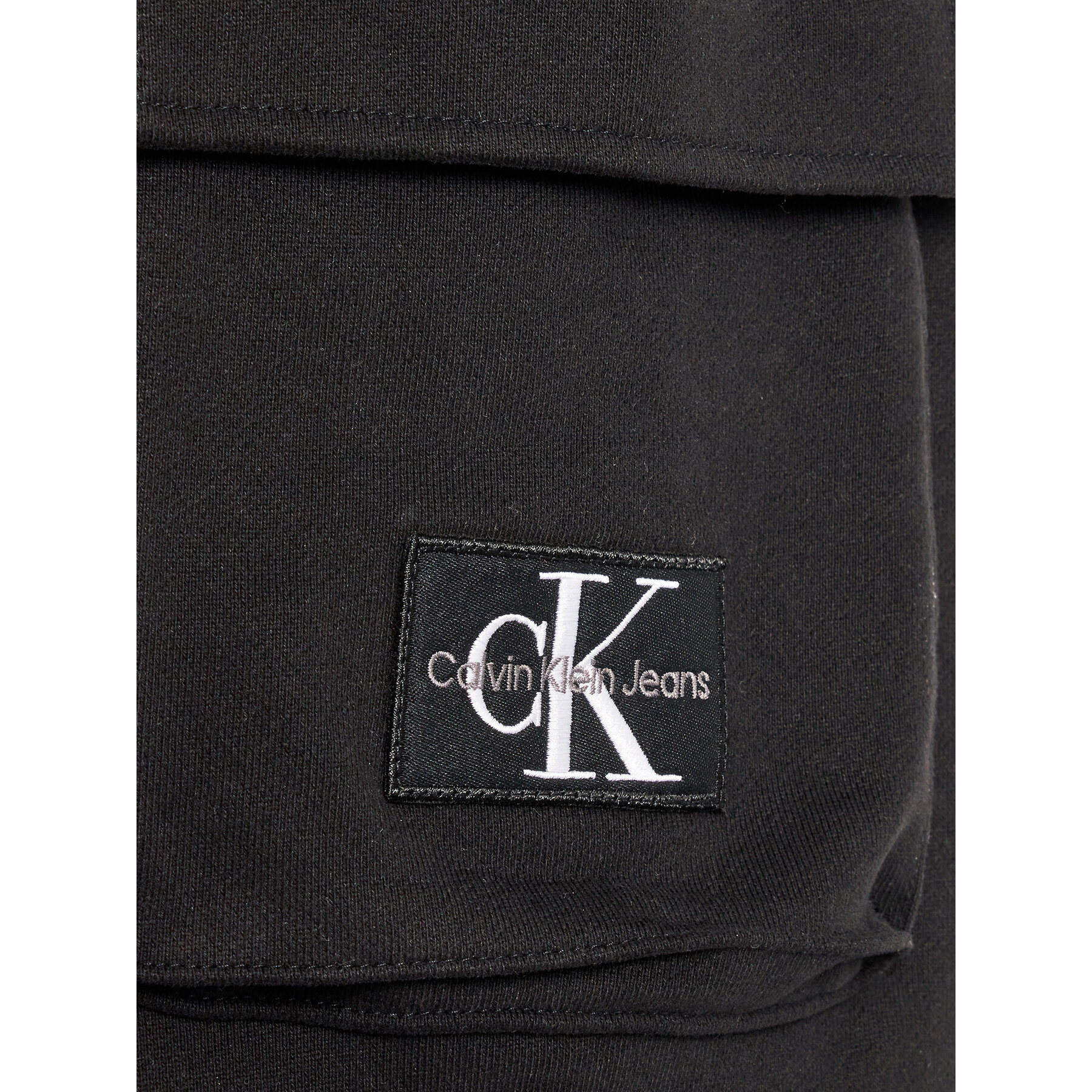 Calvin Klein Jeans Teplákové kalhoty IB0IB01600 Černá Regular Fit - Pepit.cz