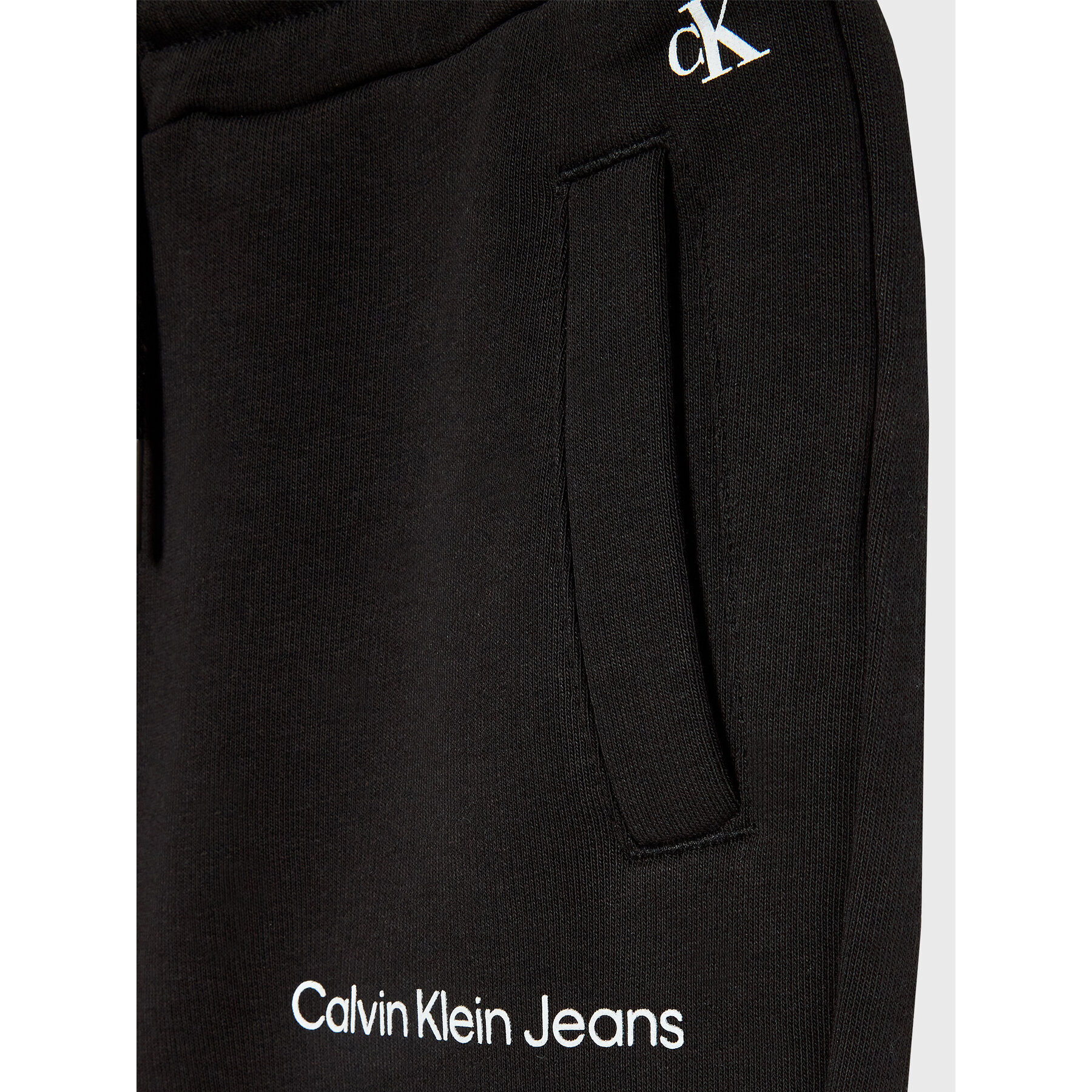 Calvin Klein Jeans Teplákové kalhoty Logo IG0IG01509 Černá Relaxed Fit - Pepit.cz