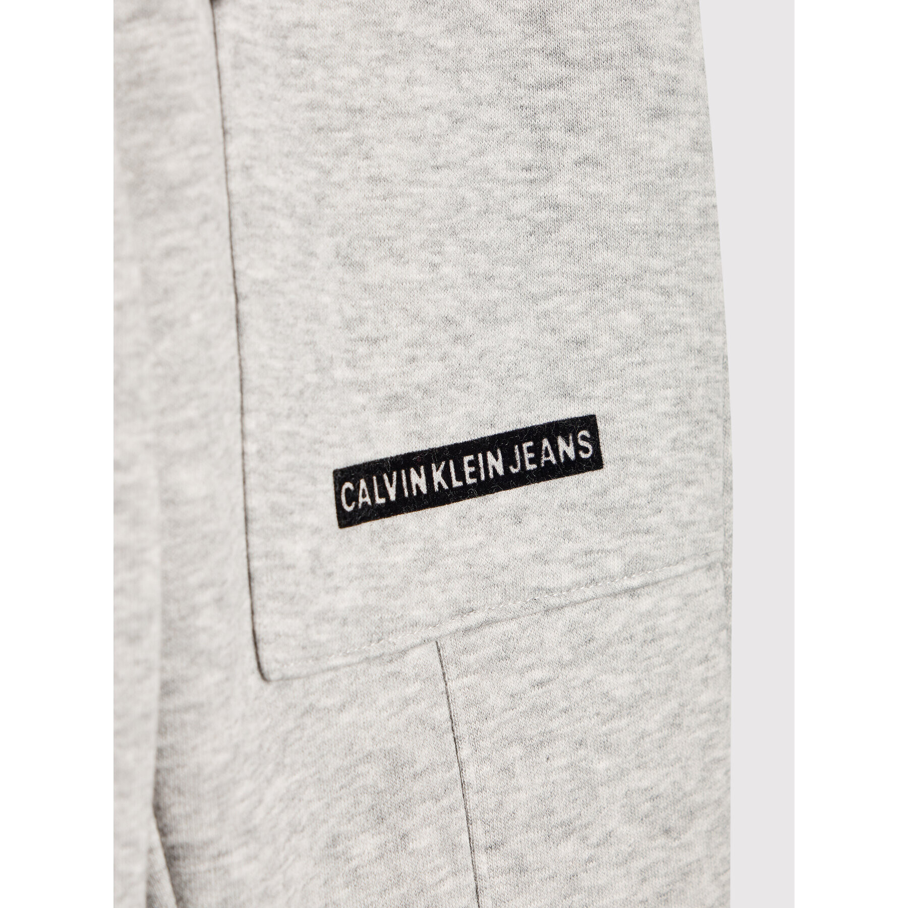 Calvin Klein Jeans Teplákové kalhoty Micro Logo IB0IB01012 Šedá Regular Fit - Pepit.cz