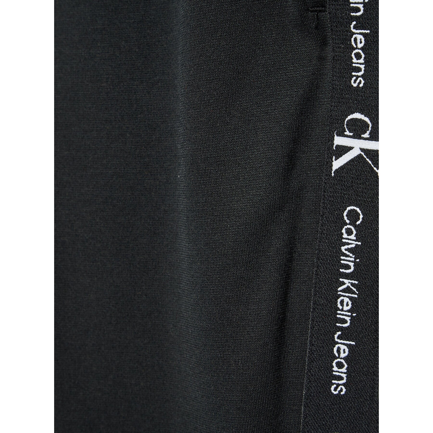 Calvin Klein Jeans Teplákové kalhoty Punto Logo IB0IB01187 Černá Regular Fit - Pepit.cz