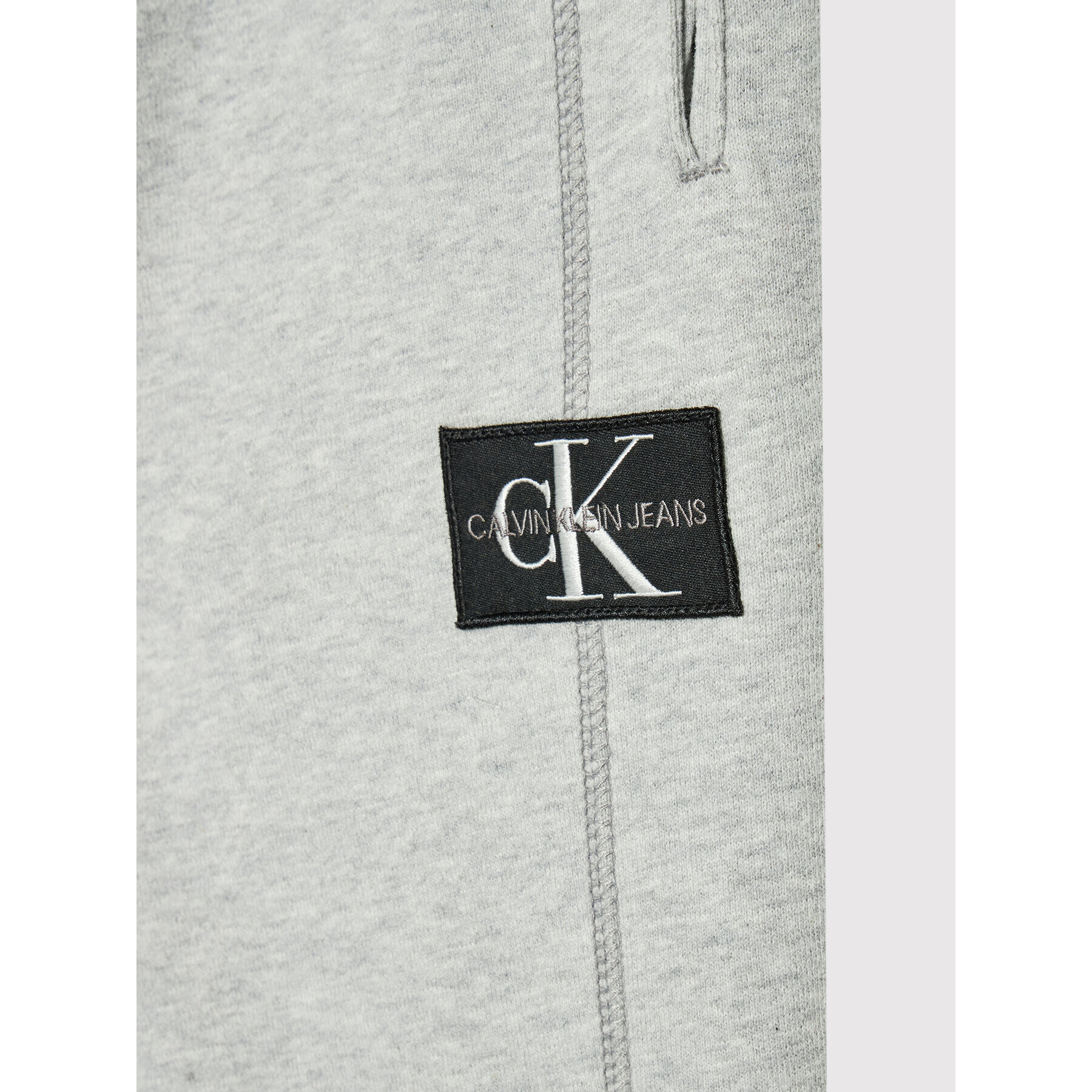 Calvin Klein Jeans Teplákové kalhoty Rib Blocking Badge IB0IB00715 Šedá Regular Fit - Pepit.cz