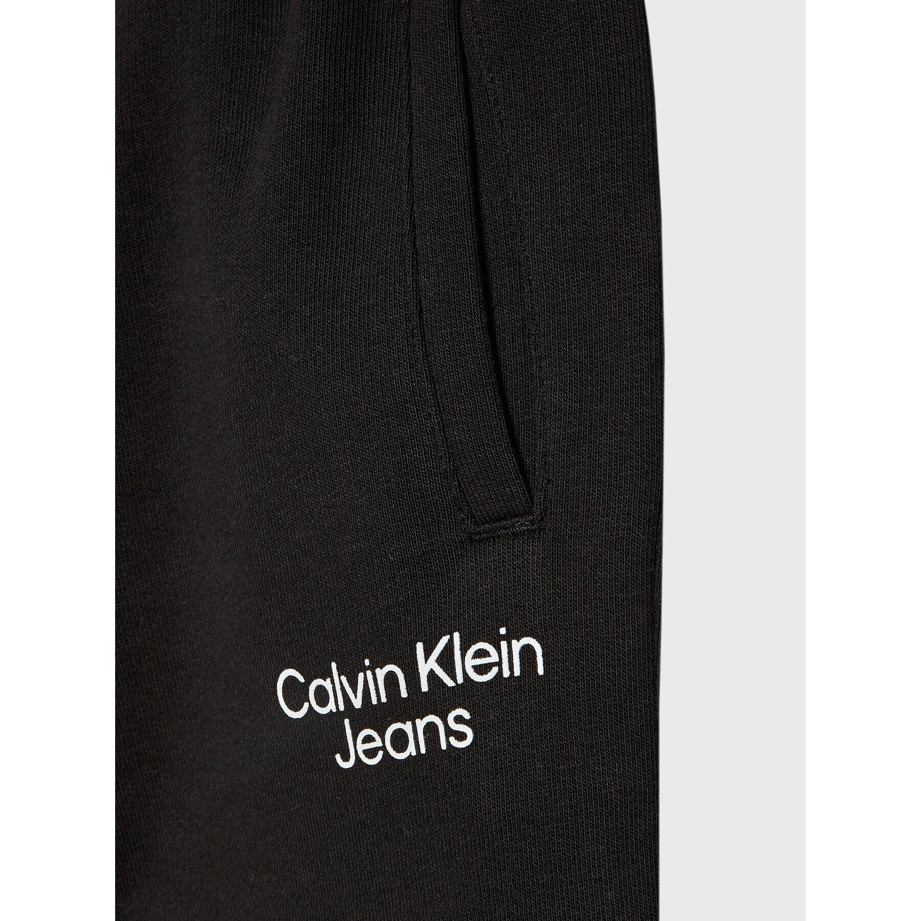 Calvin Klein Jeans Teplákové kalhoty Stack Logo IB0IB01282 Černá Regular Fit - Pepit.cz