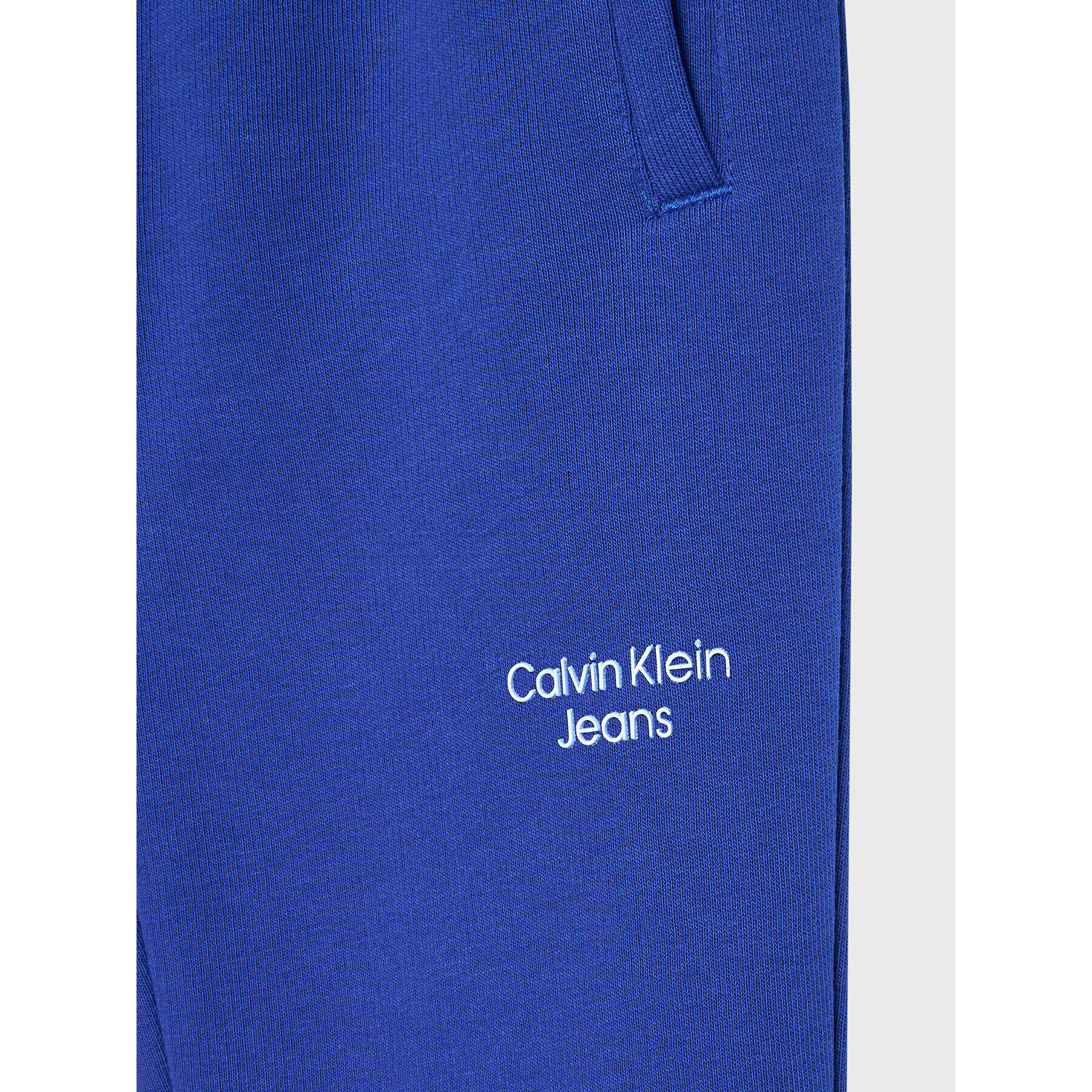 Calvin Klein Jeans Teplákové kalhoty Stack Logo IB0IB01282 Tmavomodrá Regular Fit - Pepit.cz