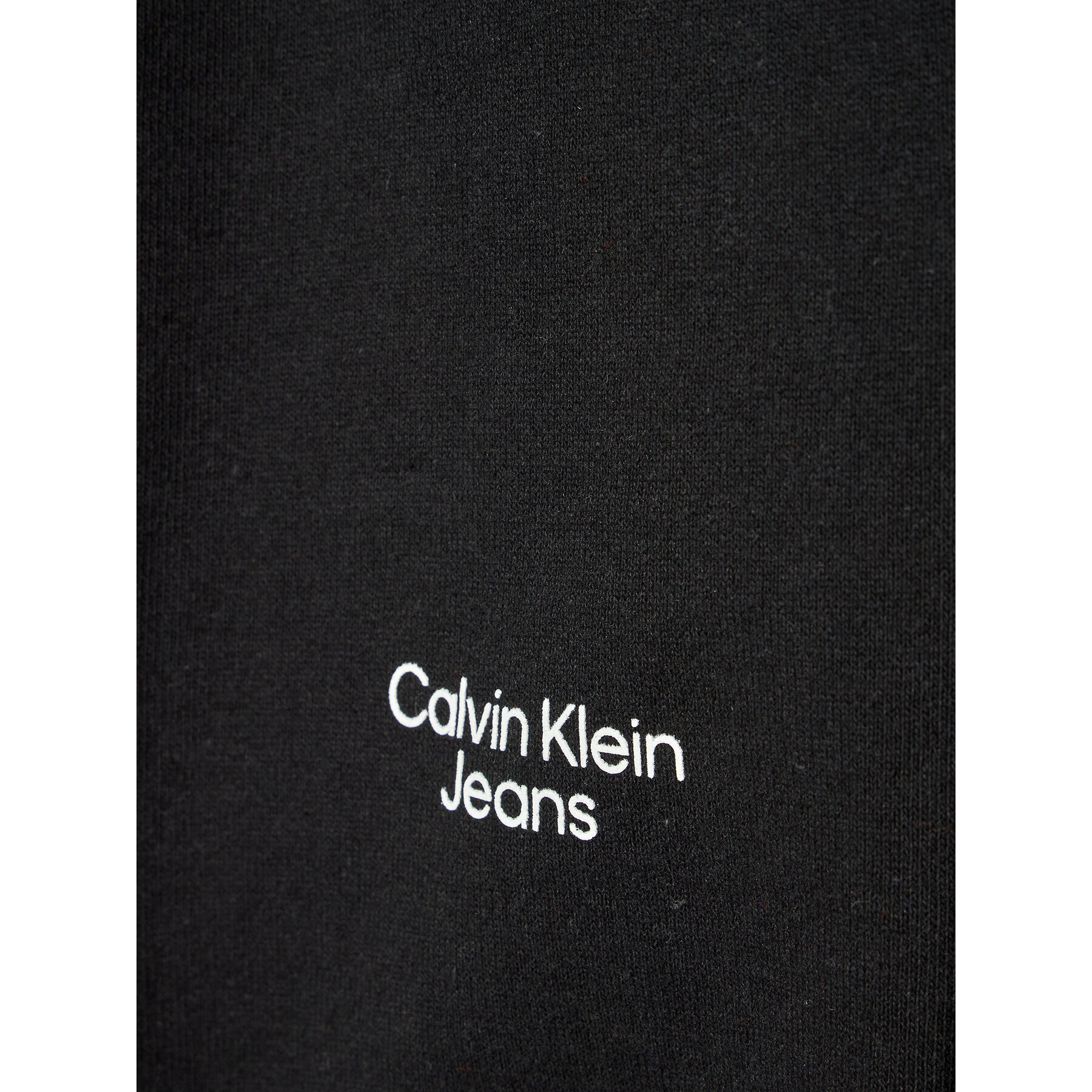 Calvin Klein Jeans Teplákové kalhoty Stacked Logo IB0IB01189 Černá Relaxed Fit - Pepit.cz