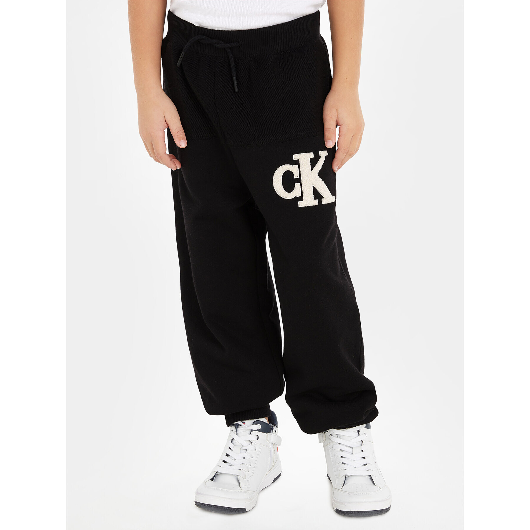 Calvin Klein Jeans Teplákové kalhoty Towelling Logopack IB0IB01677 Černá Regular Fit - Pepit.cz